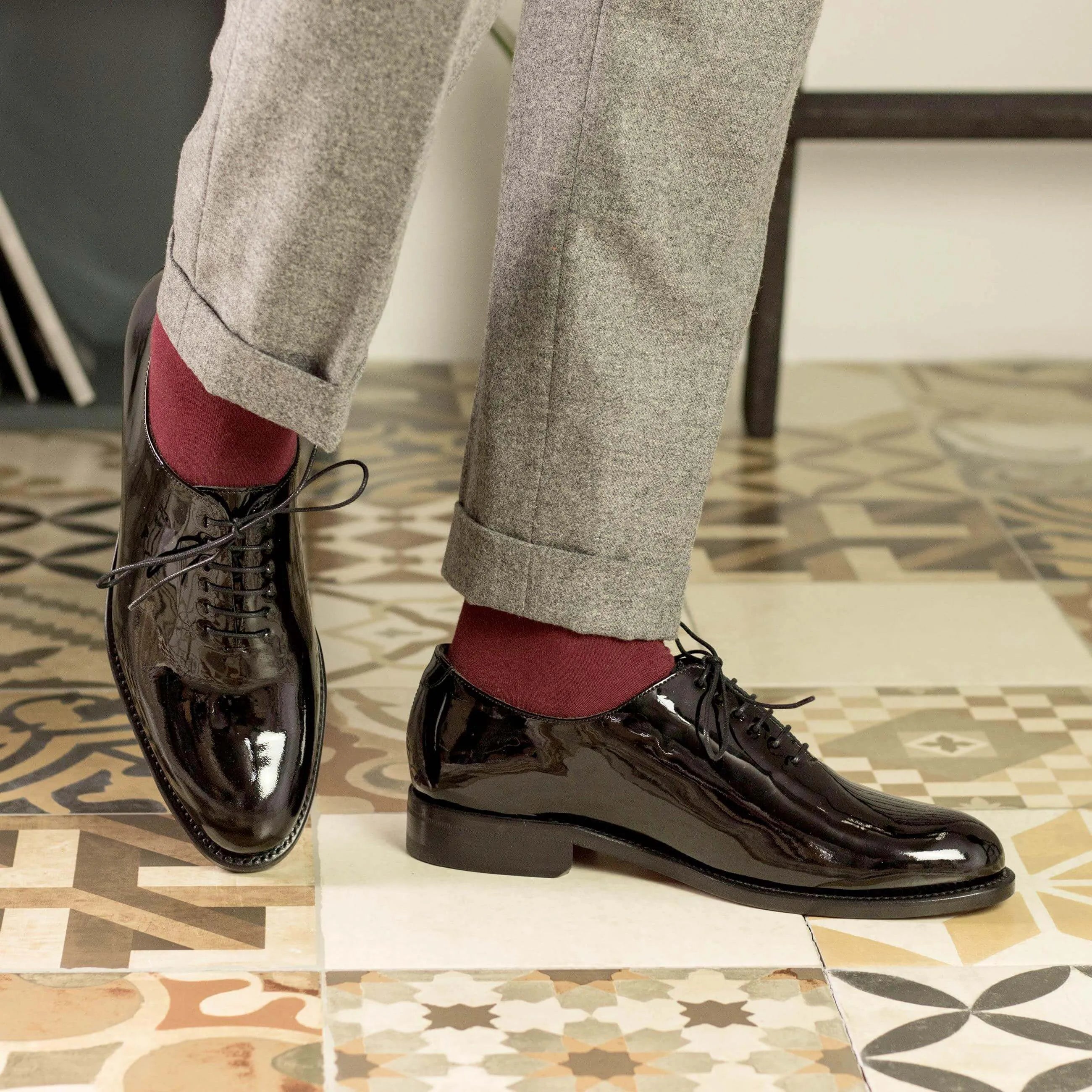 Shiny black patent leather Agent Wholecut shoes