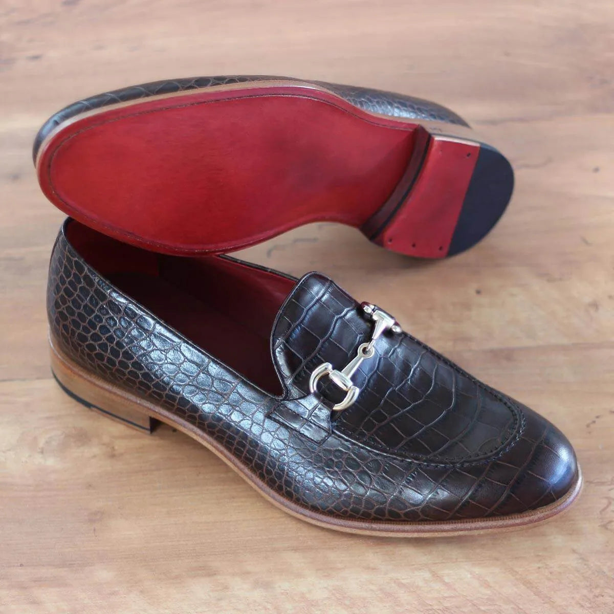 Andre loafers in crocodile-patterned box calf with red soles