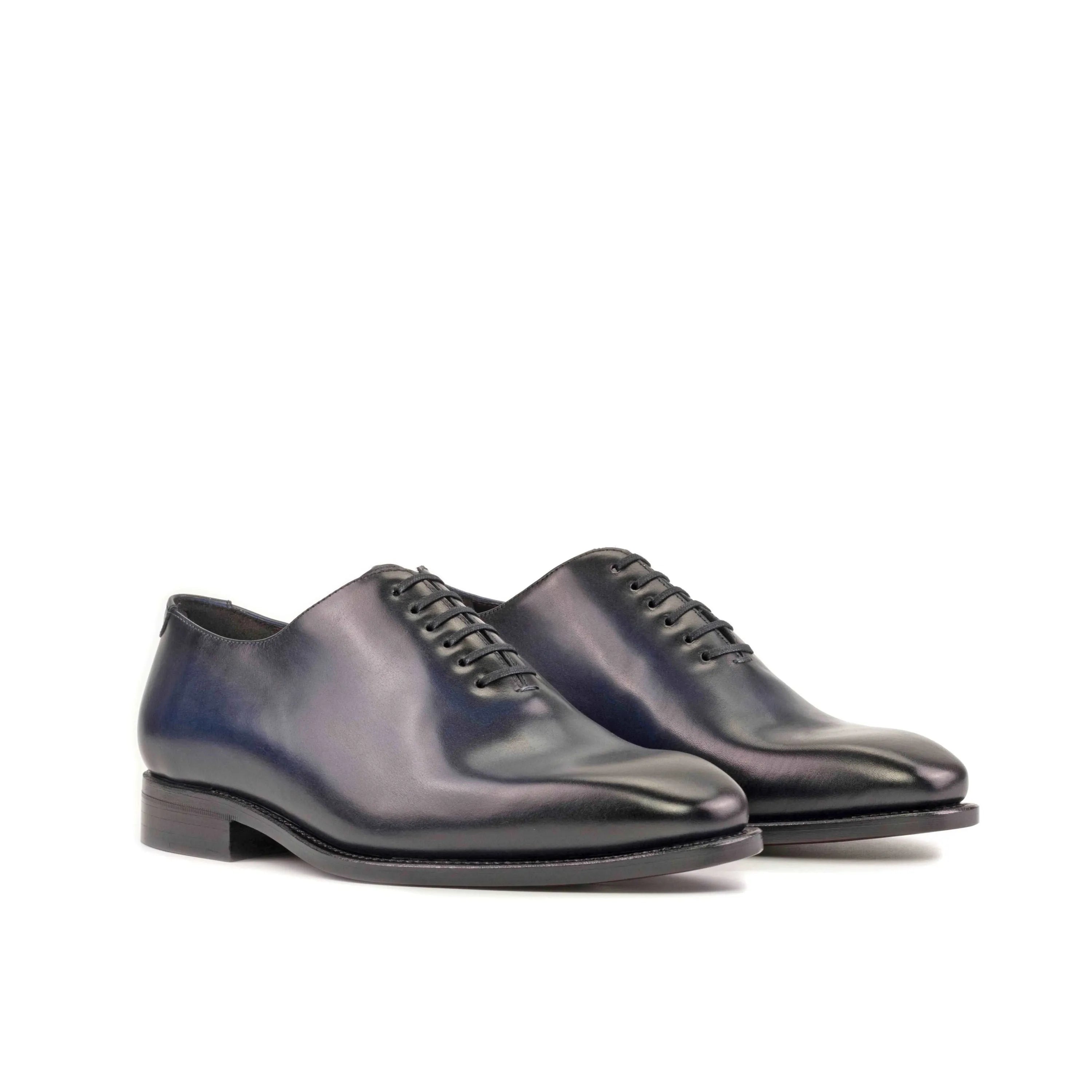 Baron wholecut shoes: pair of polished leather dress shoes