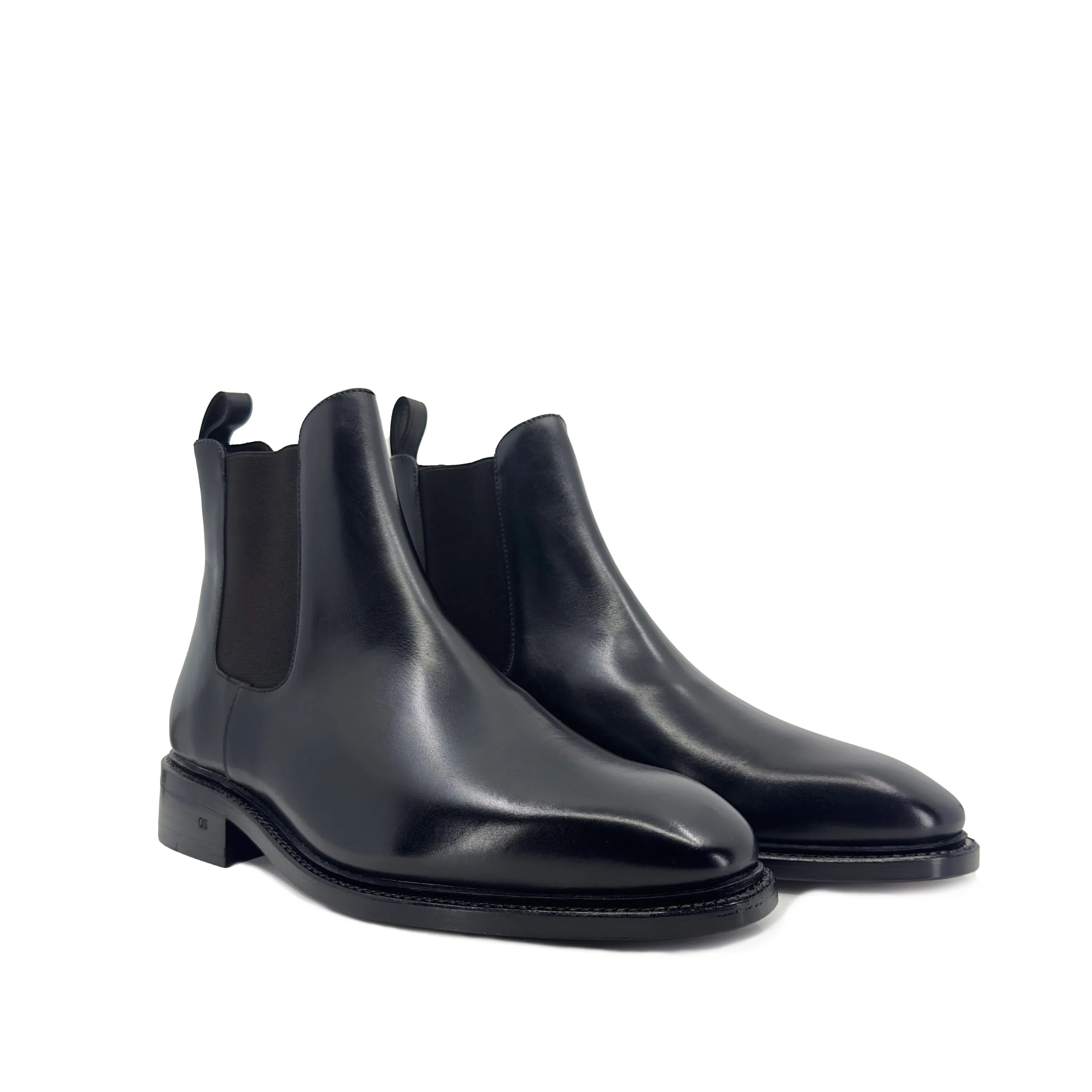 Pair of black leather Cave Chelsea boots