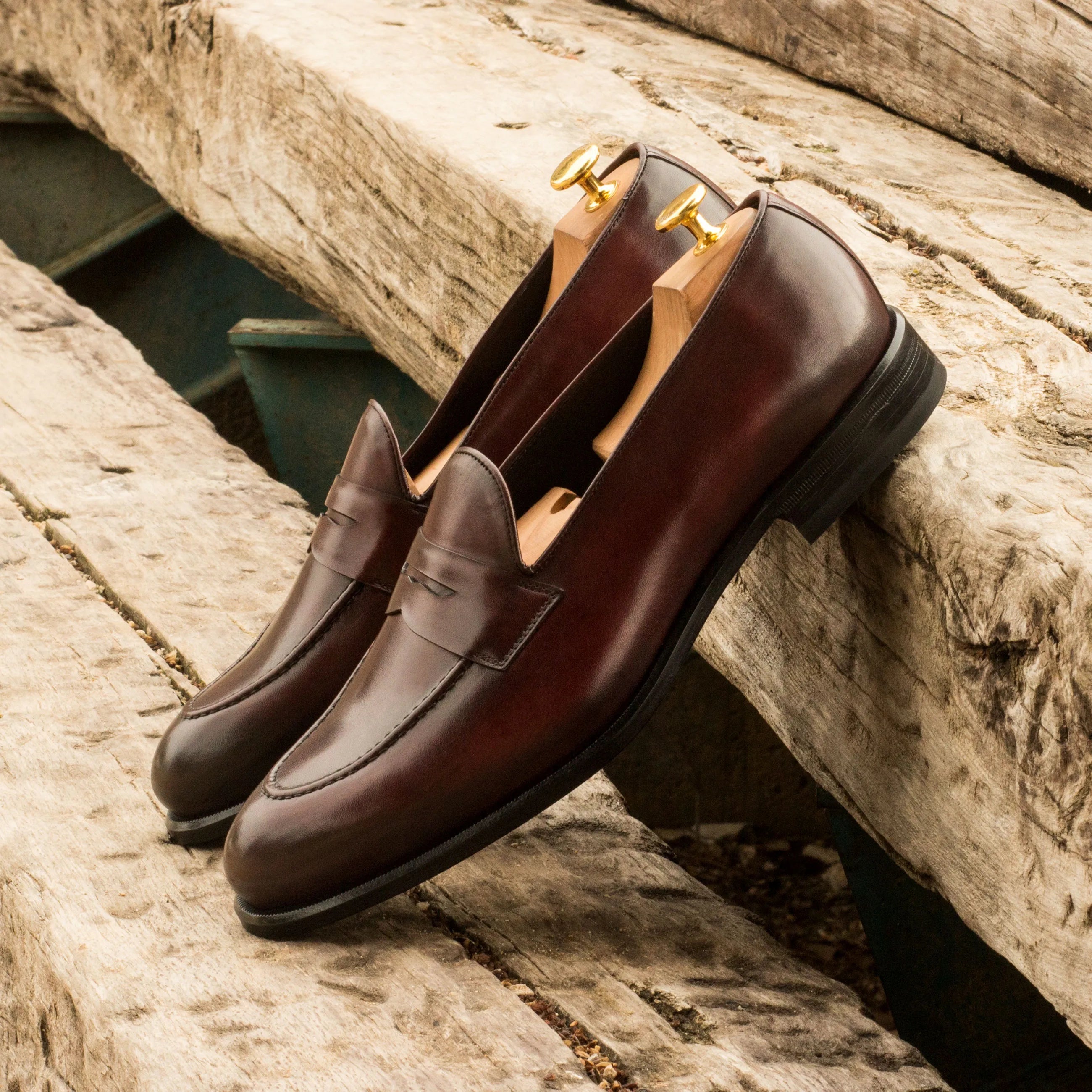 Pair of brown Cayuga loafers II with rounded toe for men