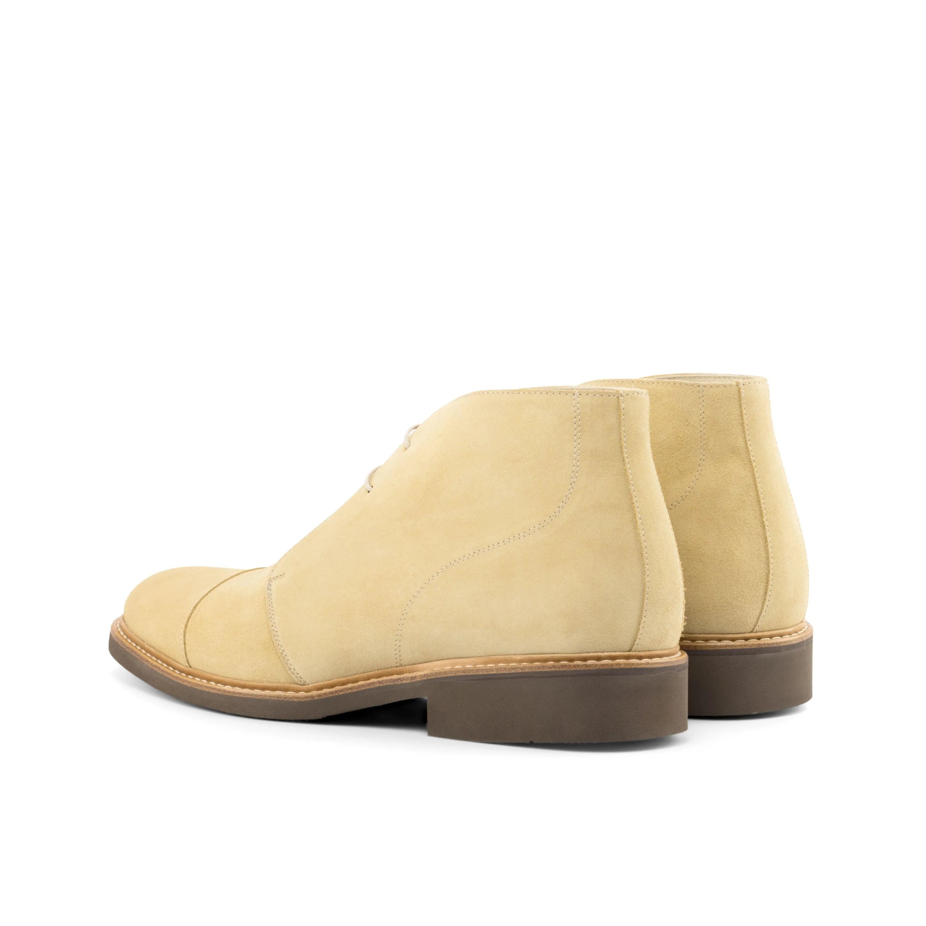 Beige suede cap-toe Dandy Chukka Boots rear view