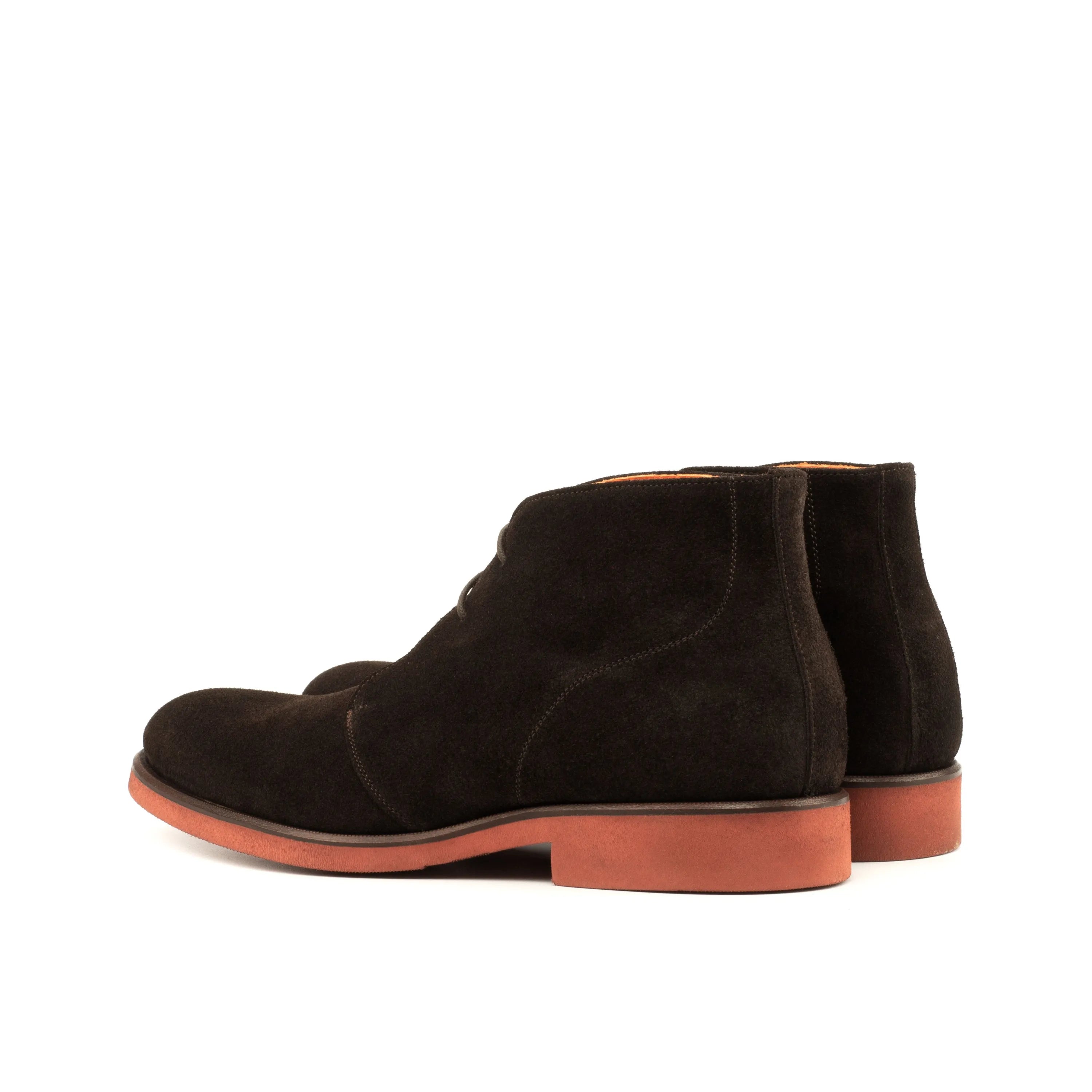 Demothi chukka boots in brown suede with red soles