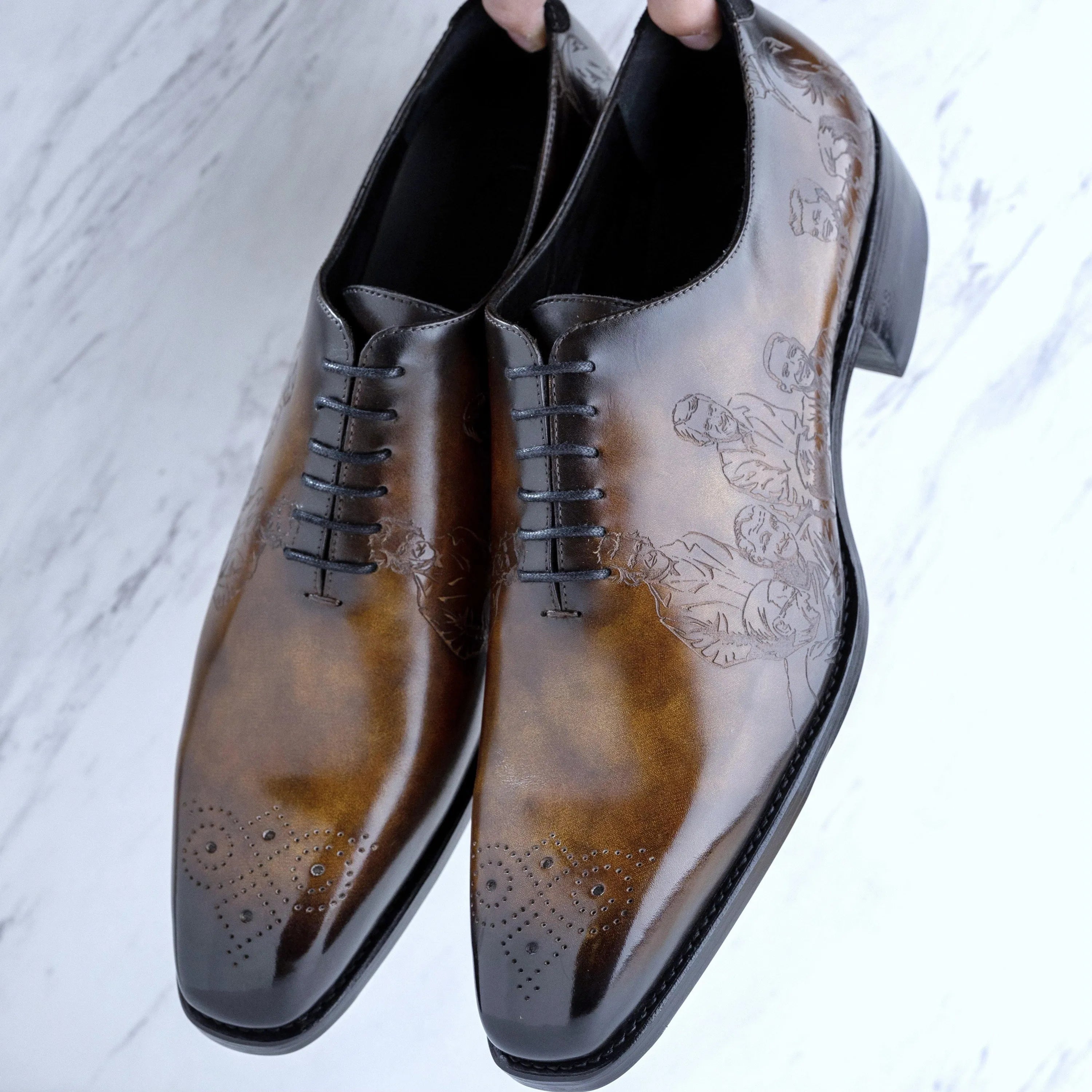 El President Patina whole cut shoes in brown Italian crust leather with floral design