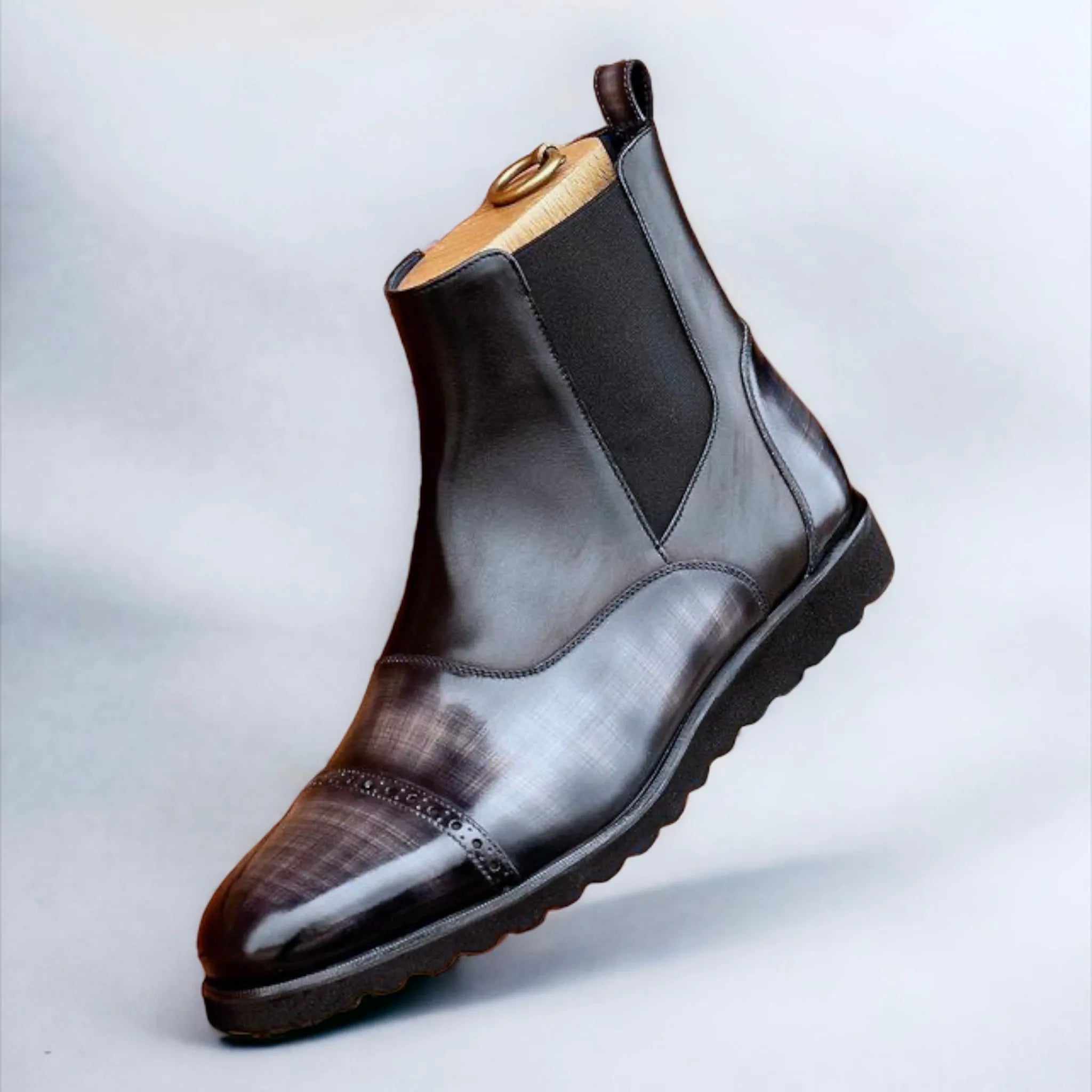 Shiny black leather Elysian Patina Chelsea boot back view
