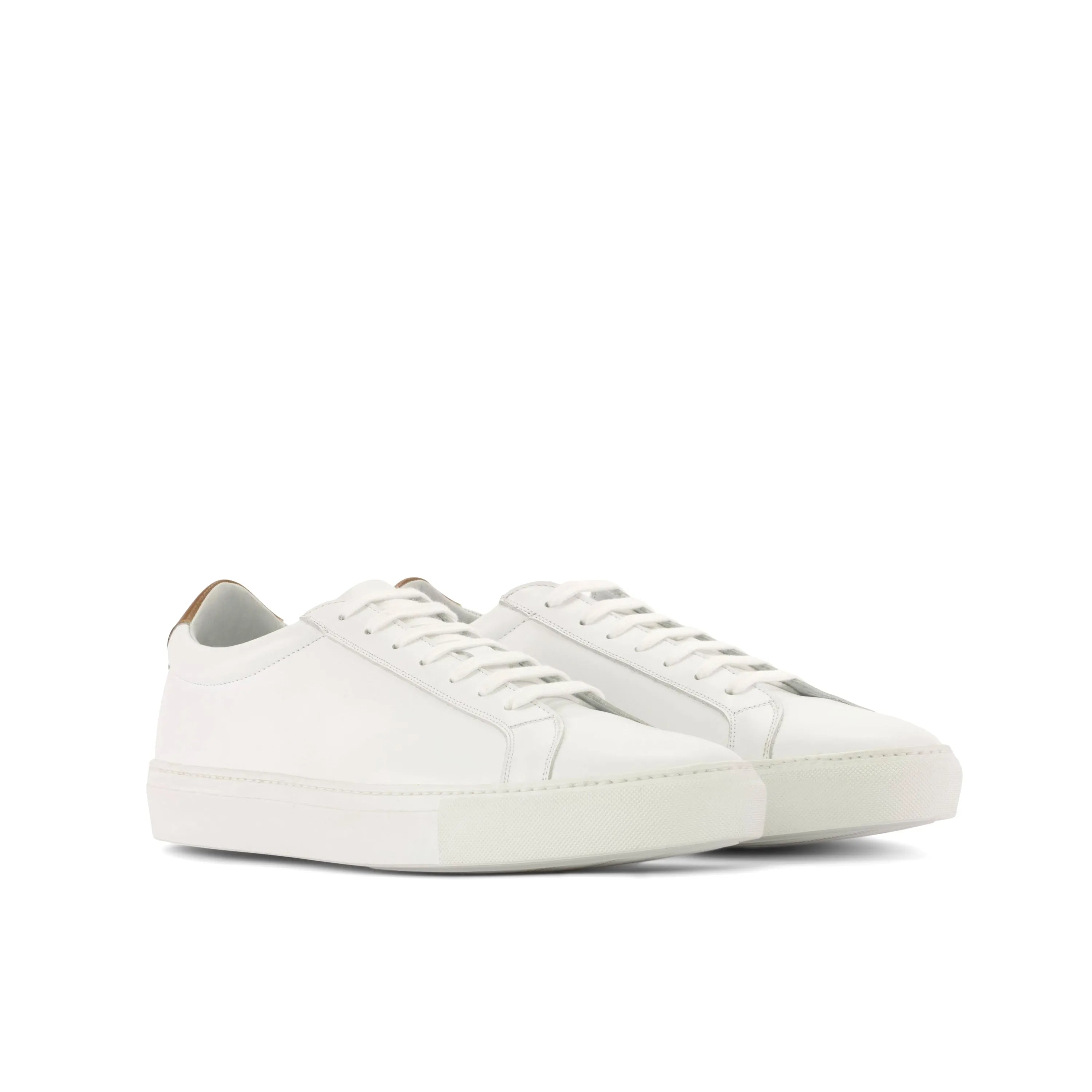 Pair of white leather Garry low kick sneakers in fast lane style