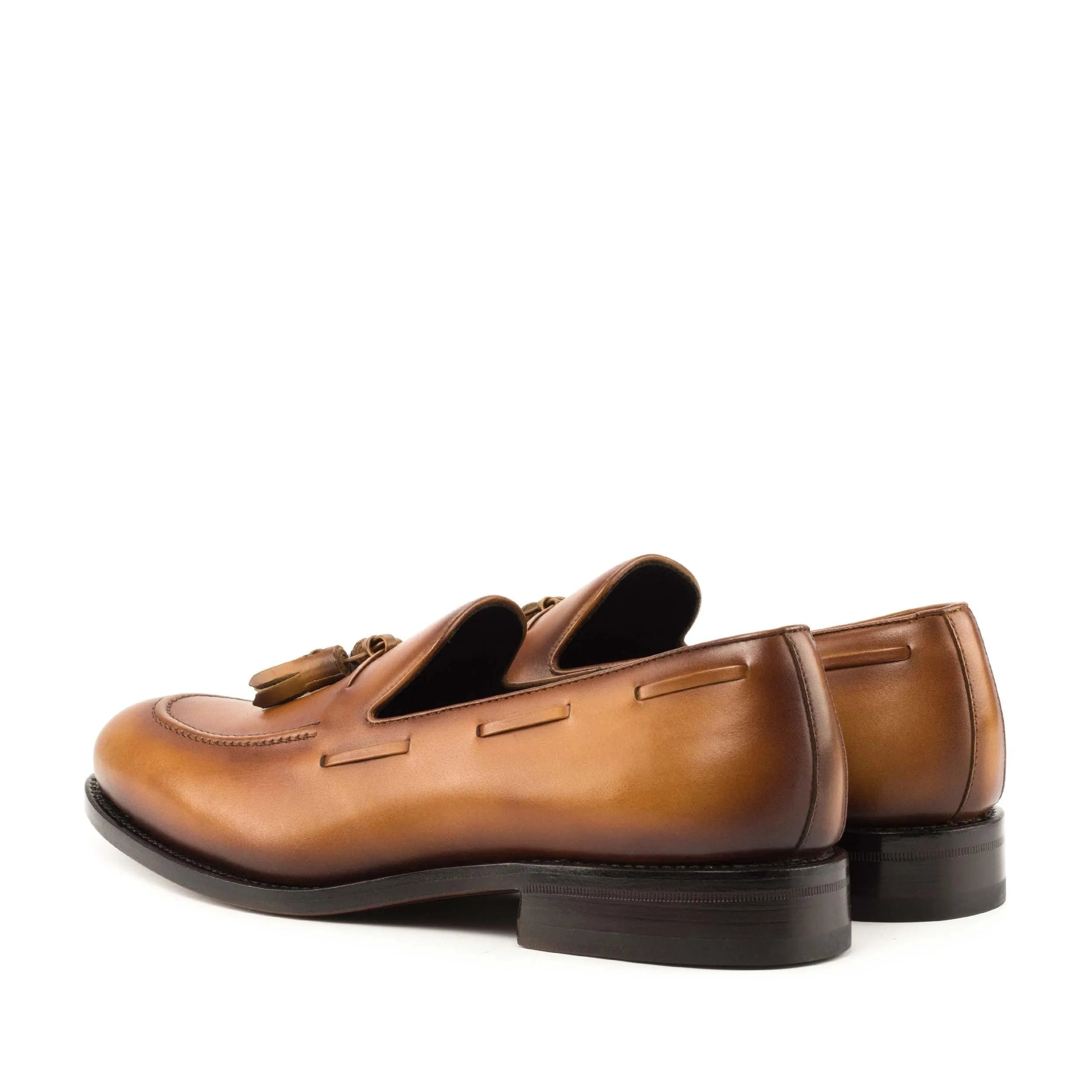 Leon loafers: brown leather tassel loafers, back view. Ships fast lane in 3-5 business days