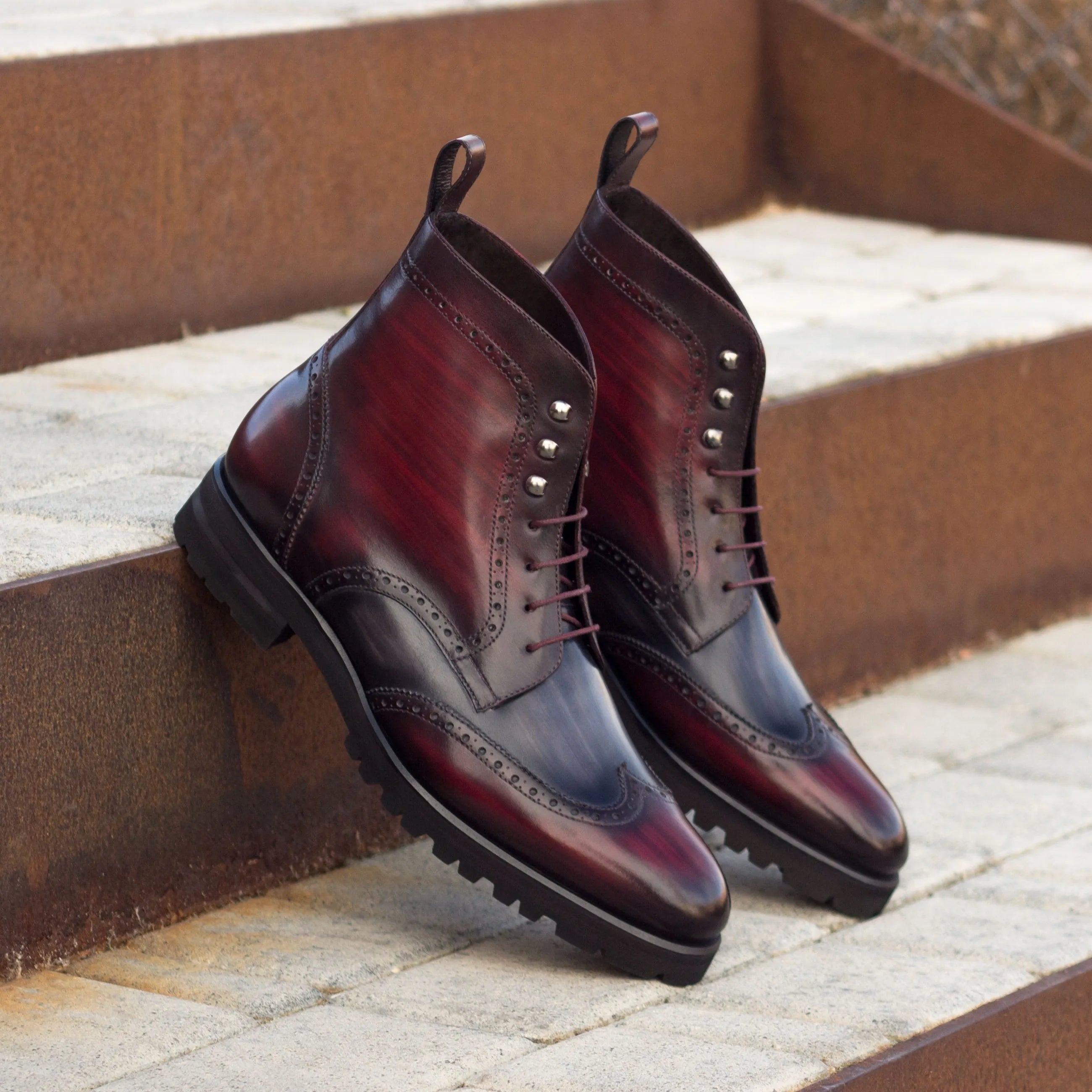 Lincoln military brogue boots in burgundy leather wingtip design