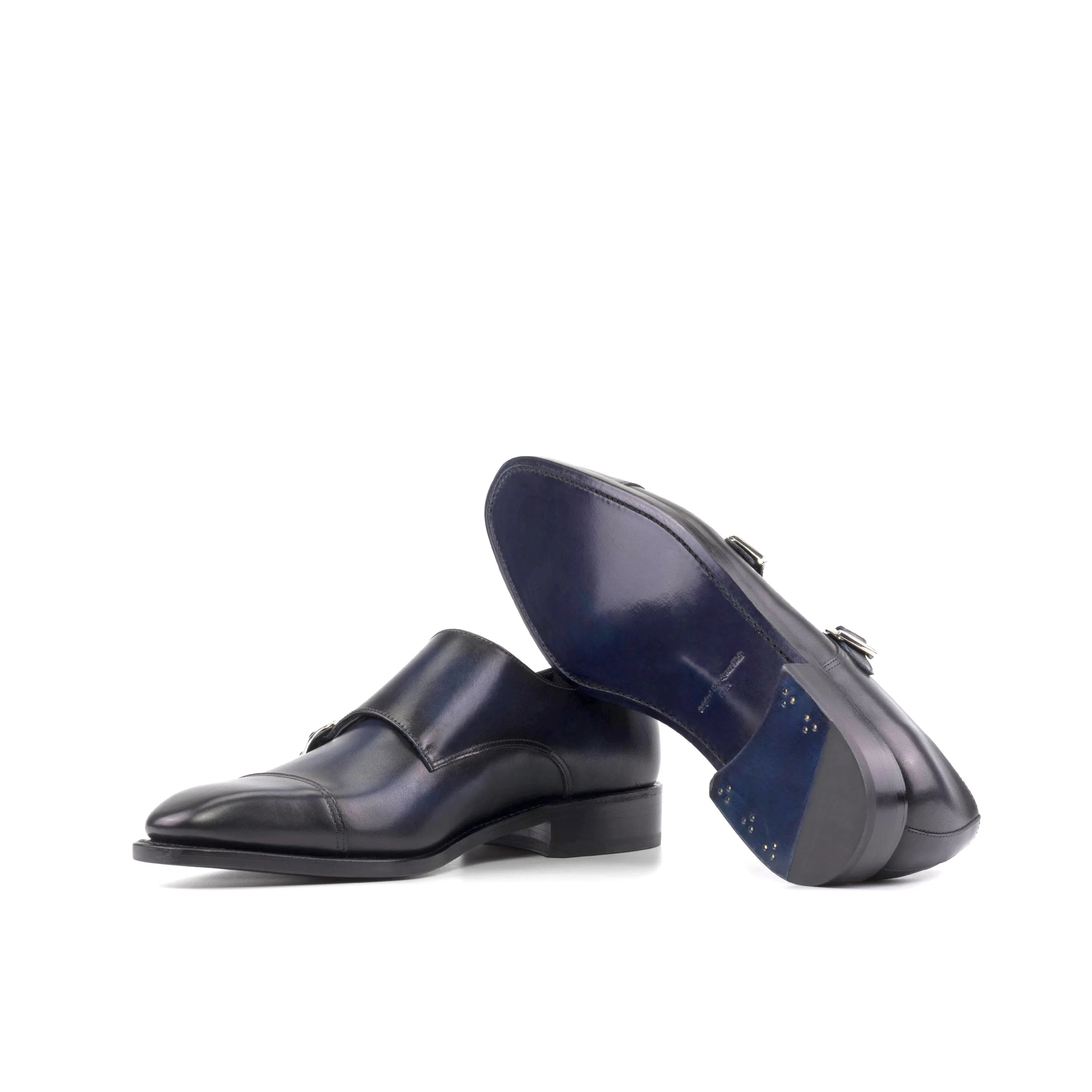 Magnus Double Monk dark blue leather shoes, pair view. Ships fast lane in 2-3 business days