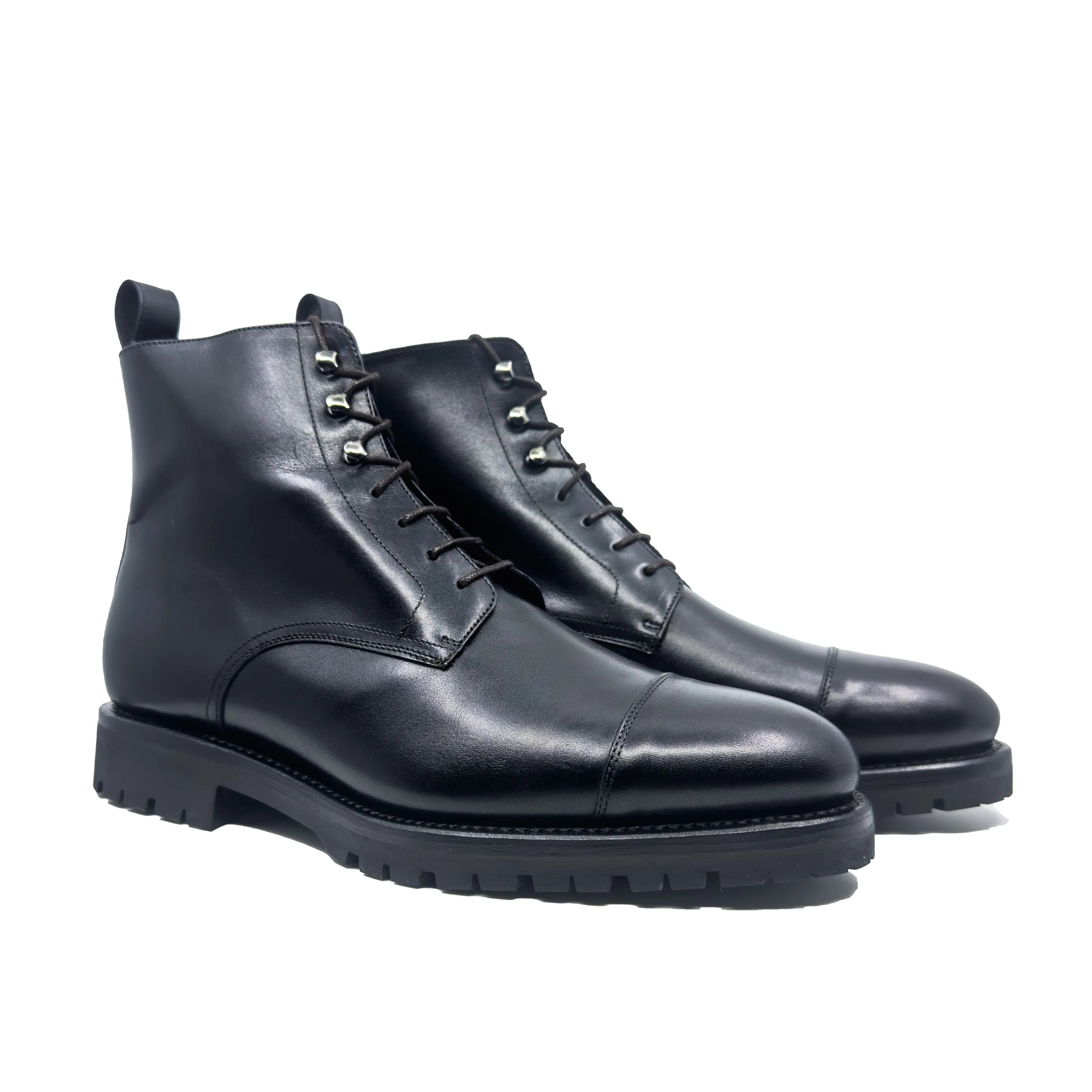 Pair of black leather cap-toe Oakland 45 jumper boots