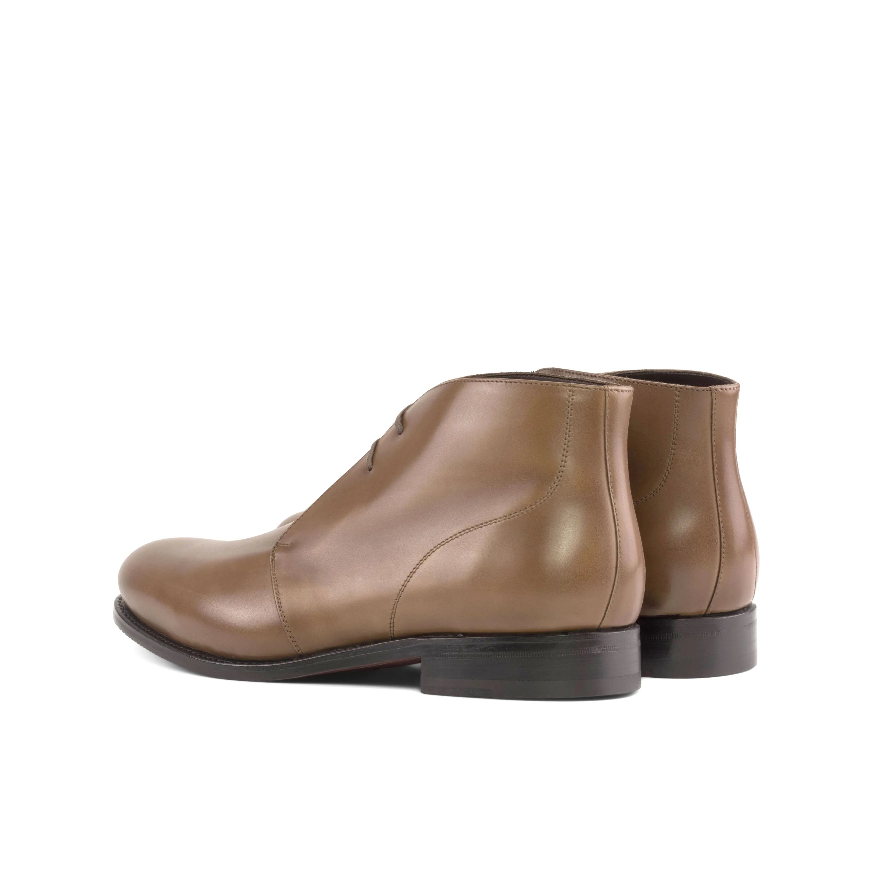 Pair of brown leather Olian Chukka boots in fast lane style