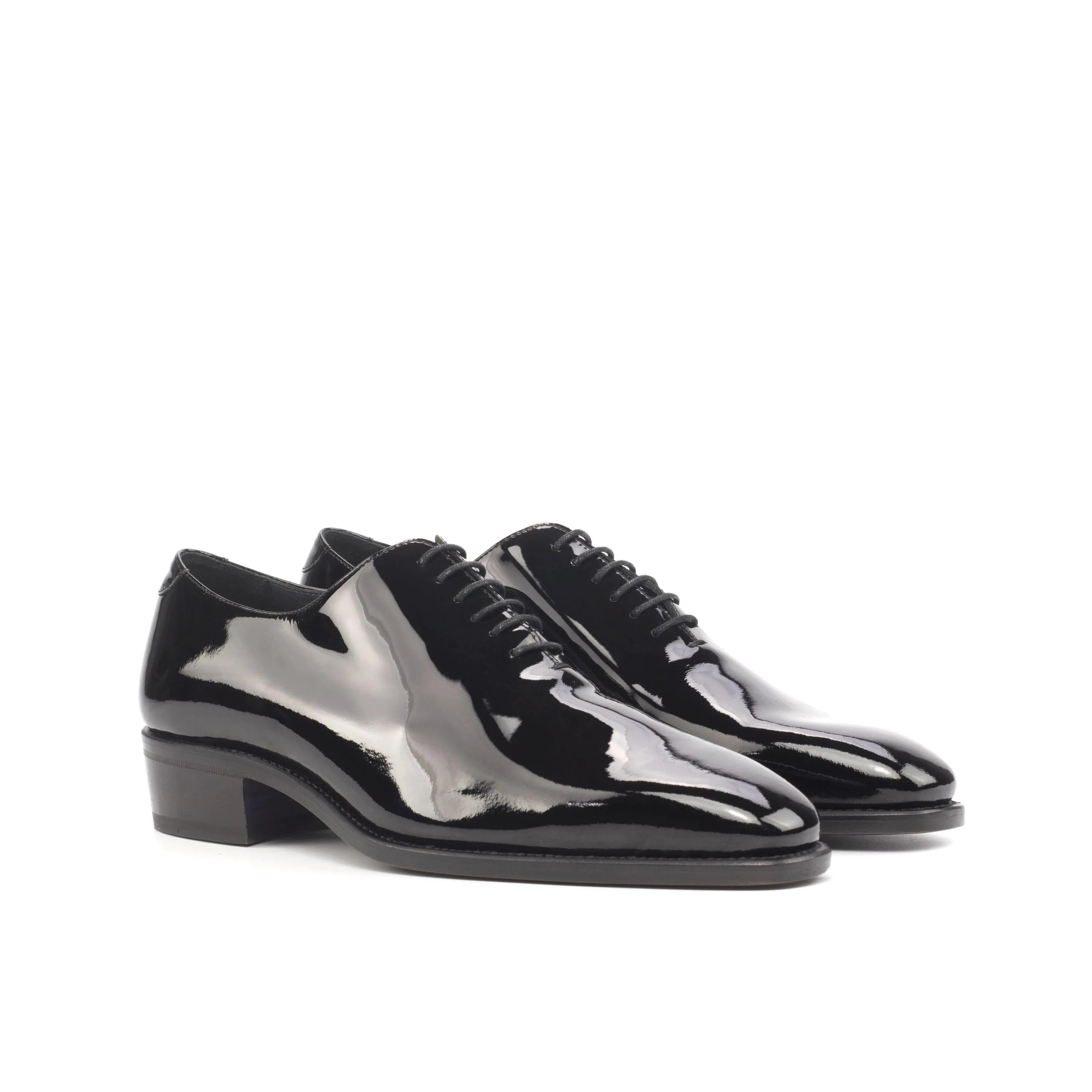 Pair of shiny black Proper Wholecut shoes