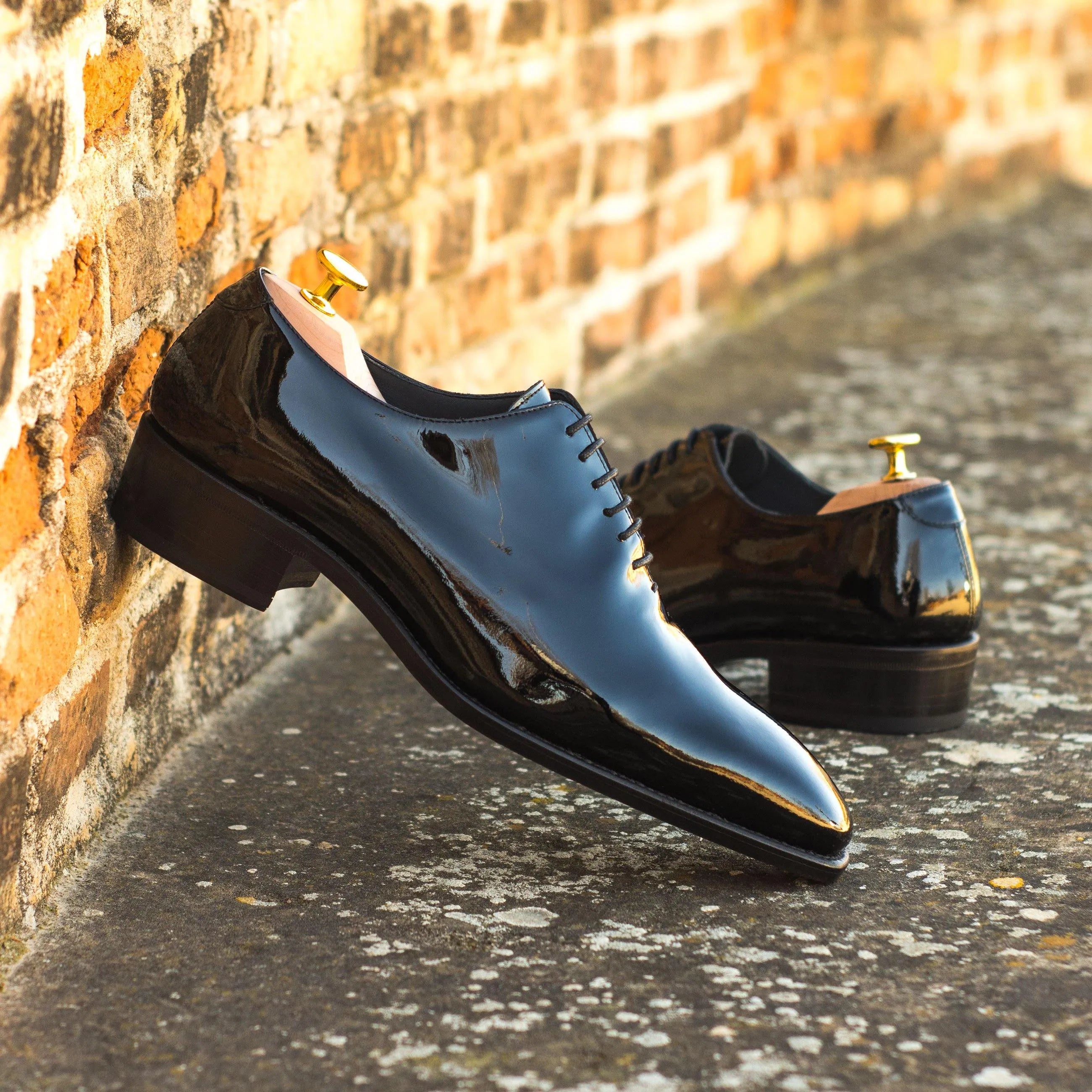 Shiny black patent leather Proper Wholecut shoes