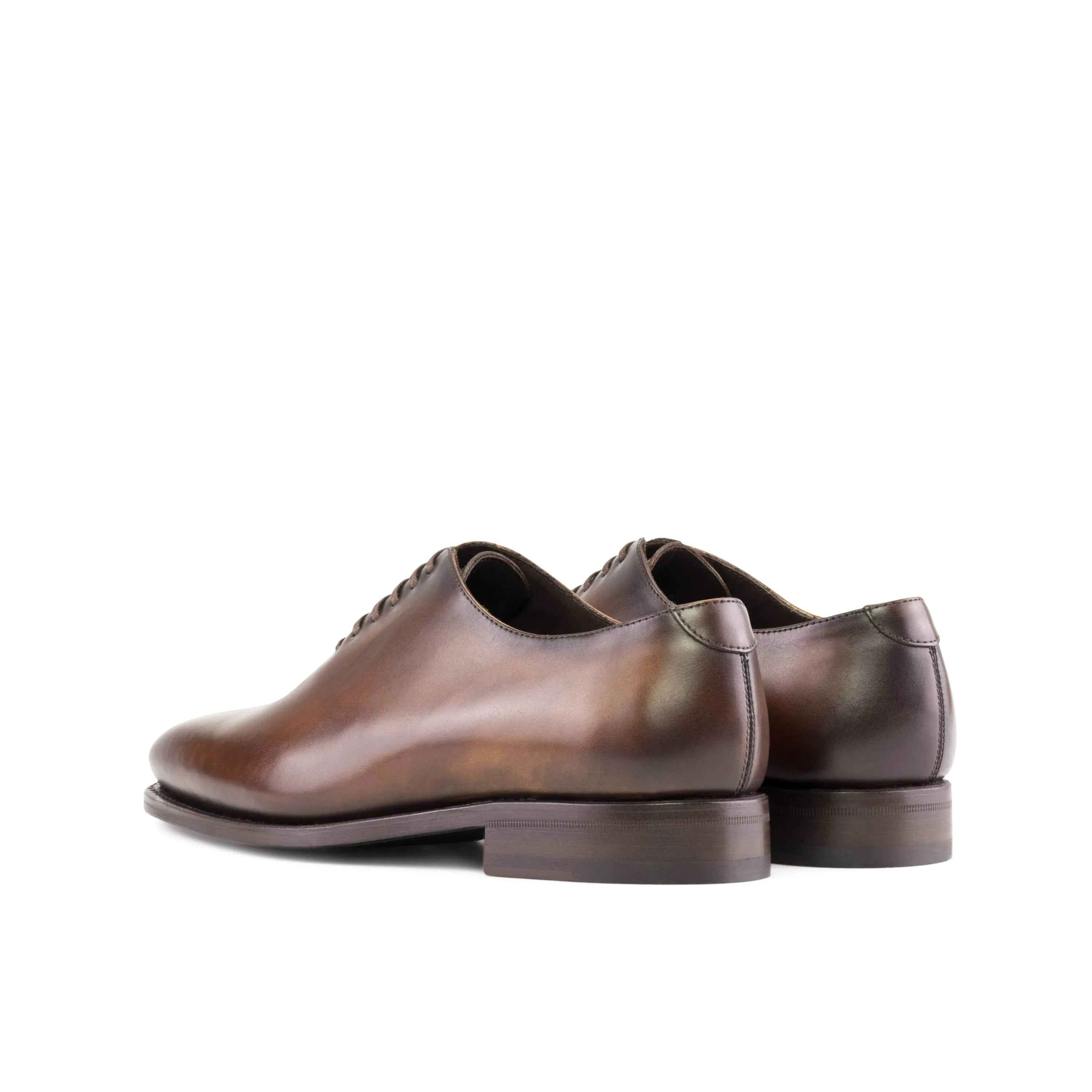 Pair of brown leather Renzo Wholecut shoes