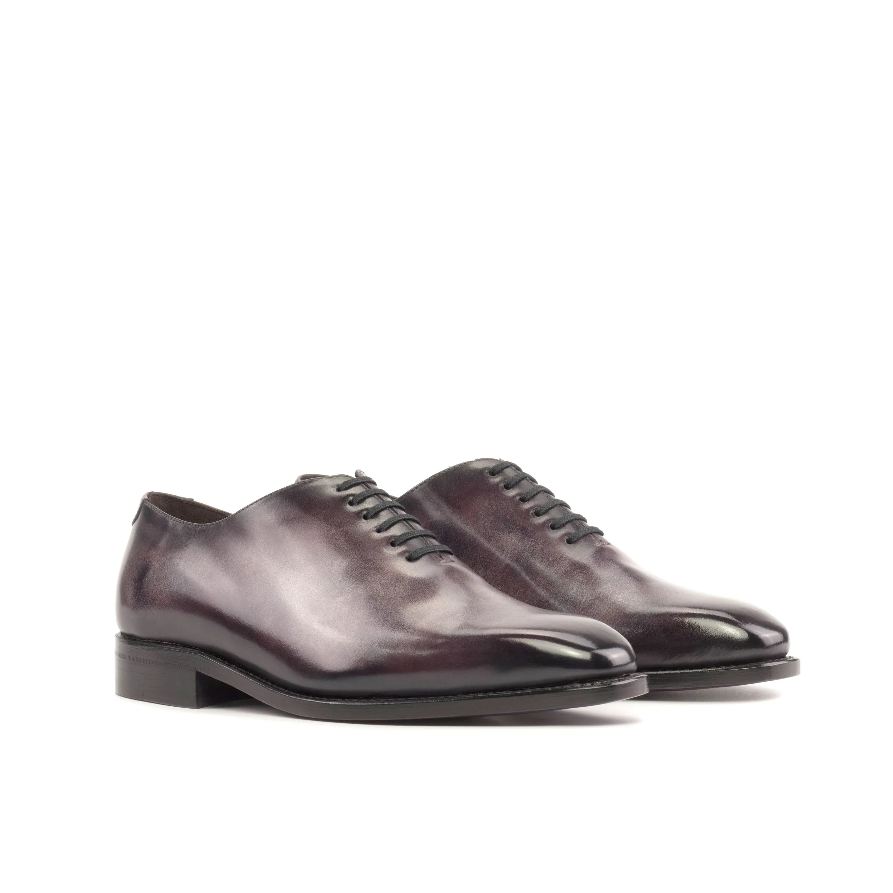 Tinzi Patina Wholecut shoes: pair of polished leather dress shoes