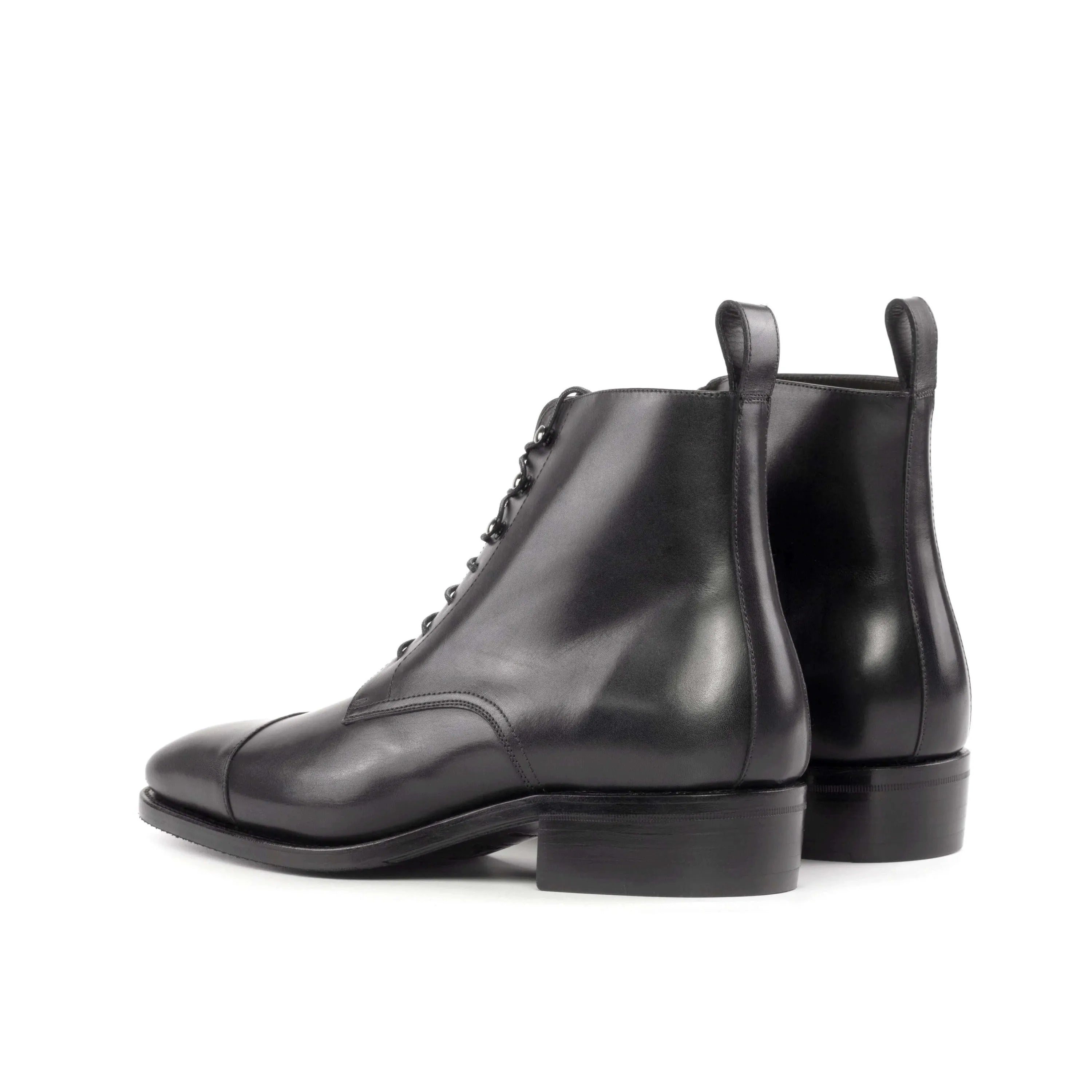 Pair of black leather lace-up 1955 Jumper Boots back view