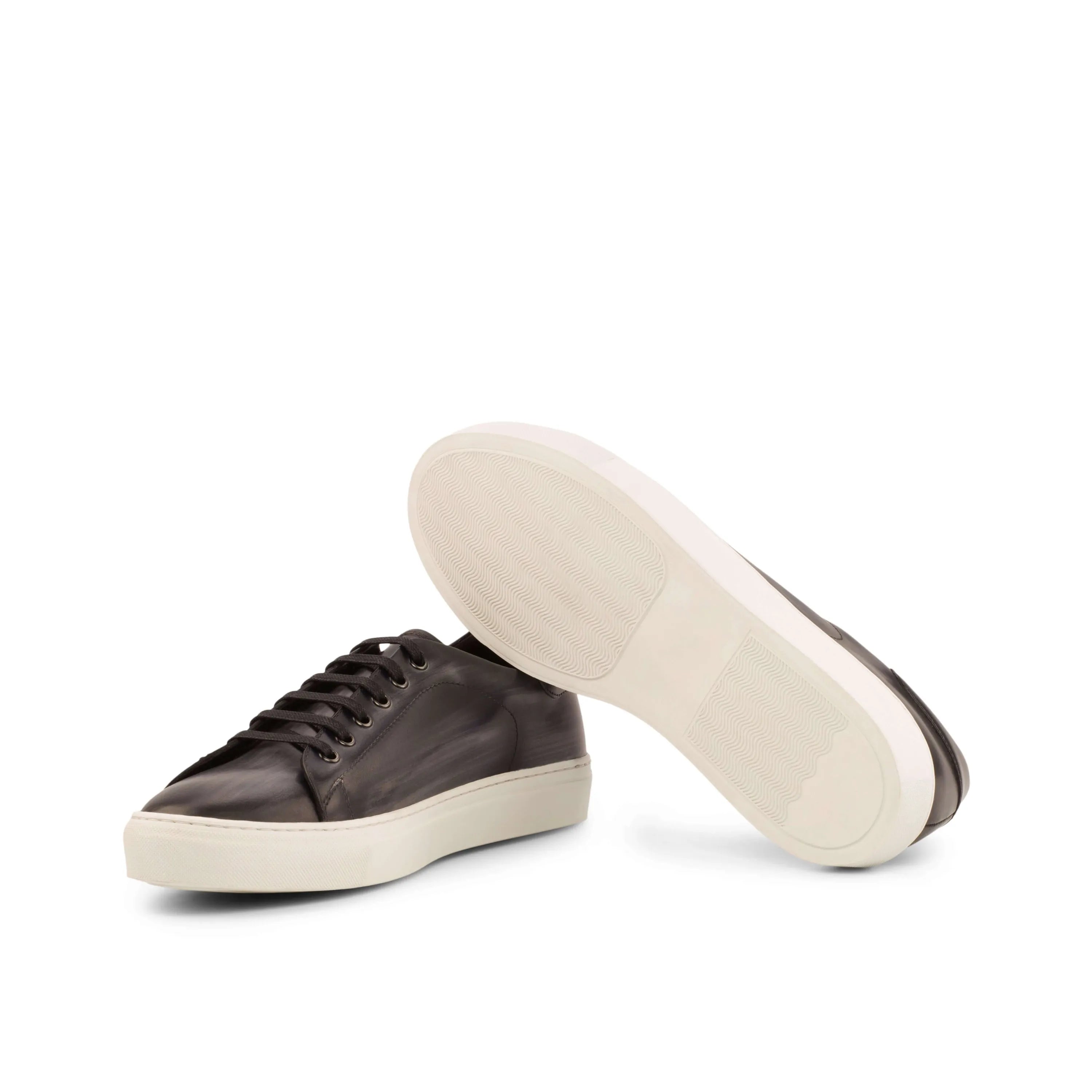 Pair of brown leather C68 trainer patina cupsole sneakers