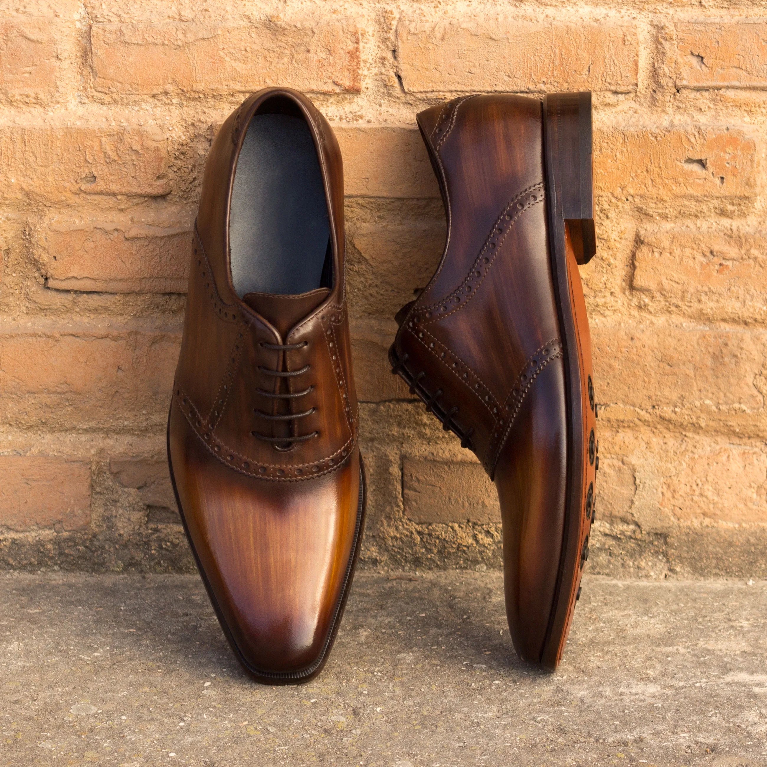 Chhota saddle patina shoes: pair of brown leather dress shoes