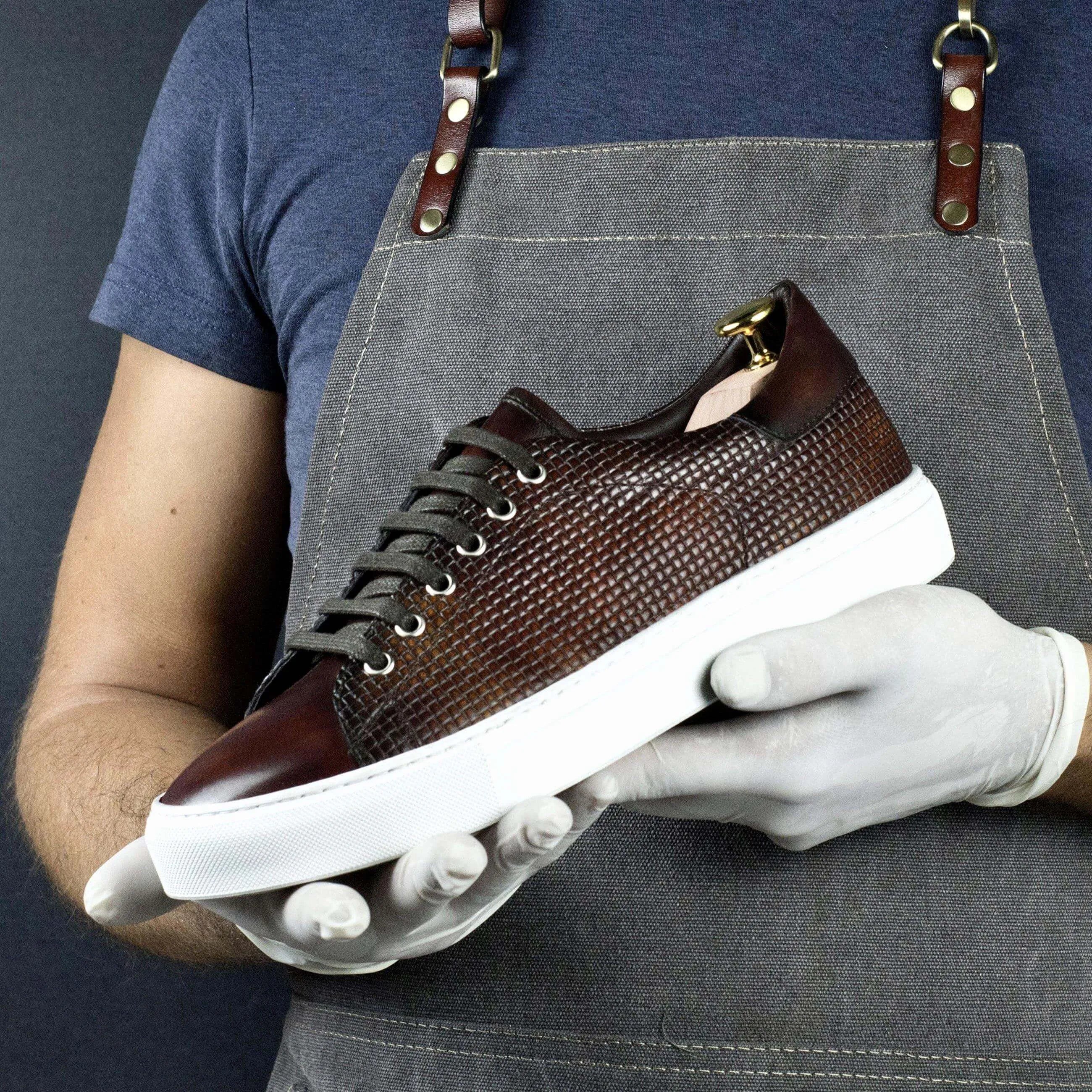 Brown Copa Braided Patina sneaker with leather upper and white sole
