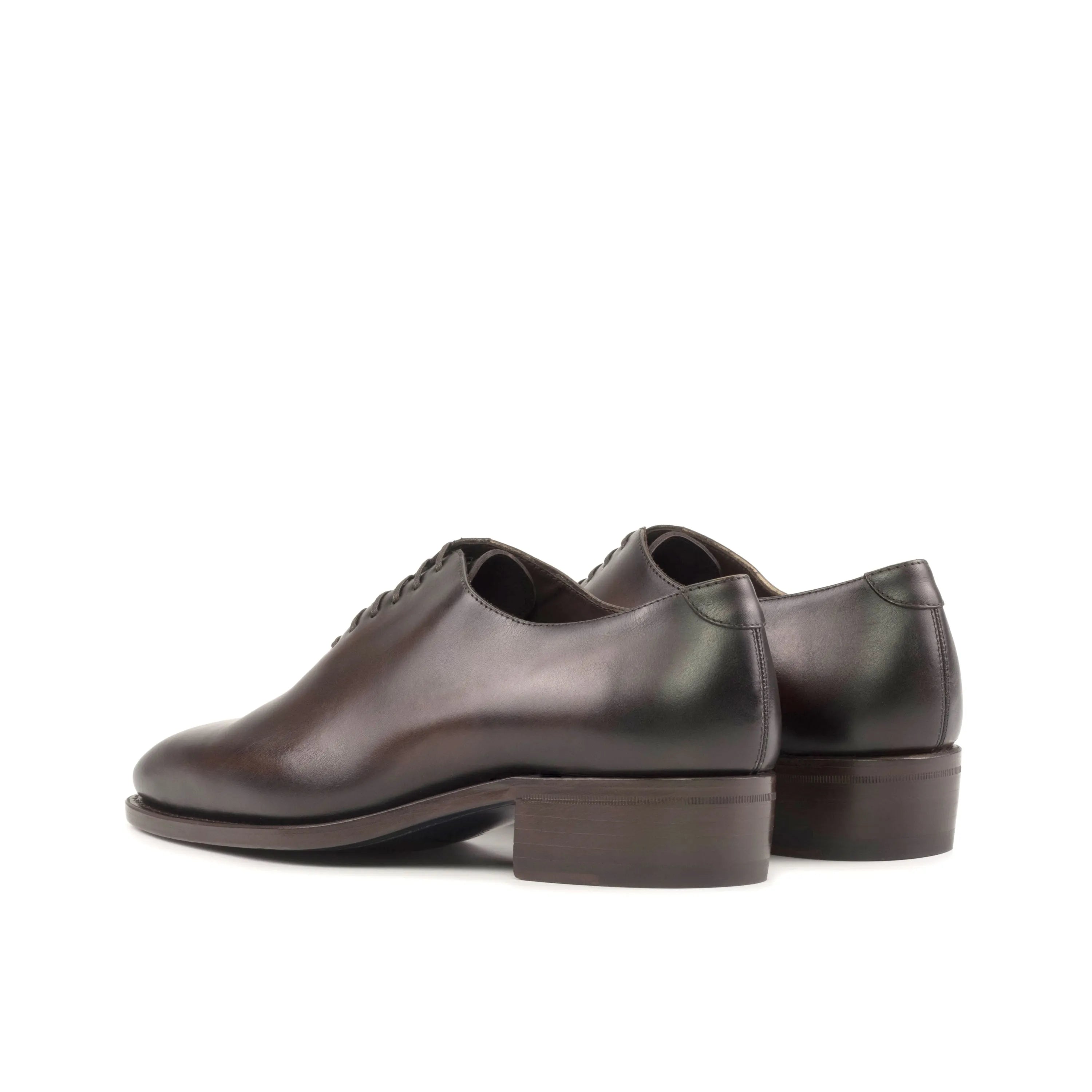 Pair of brown leather Elio wholecut shoes
