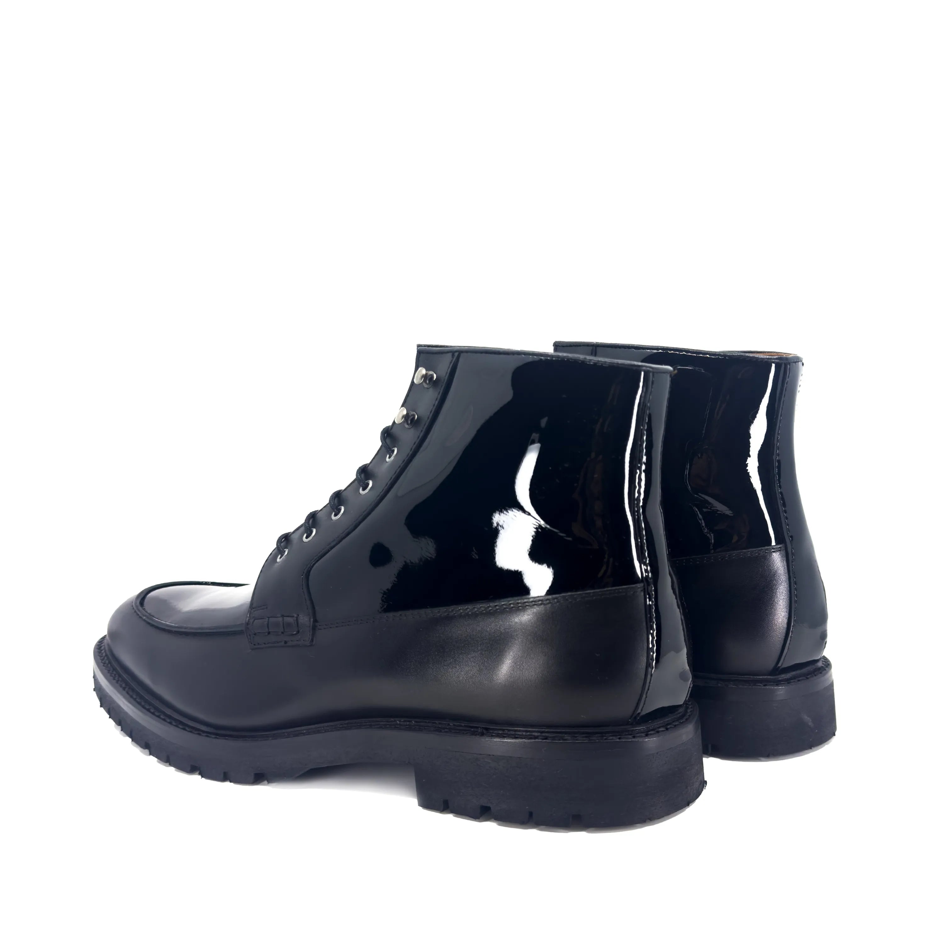 Pair of black patent leather Grandeur Moc Boot II