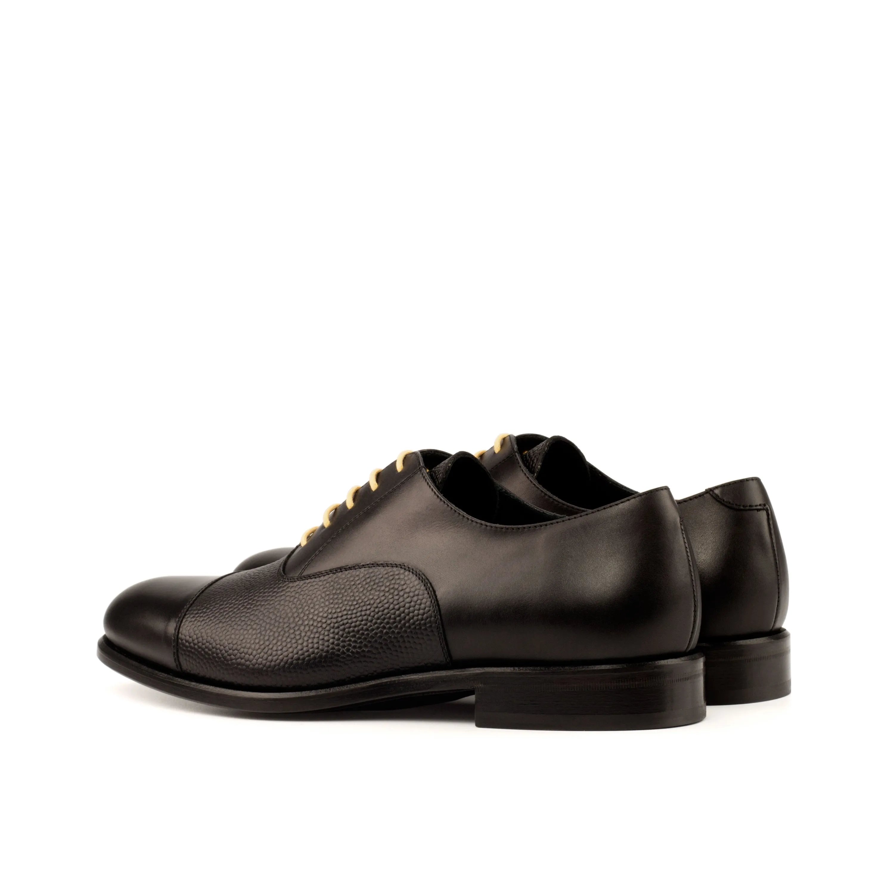 Pair of black leather Honon Oxford shoes