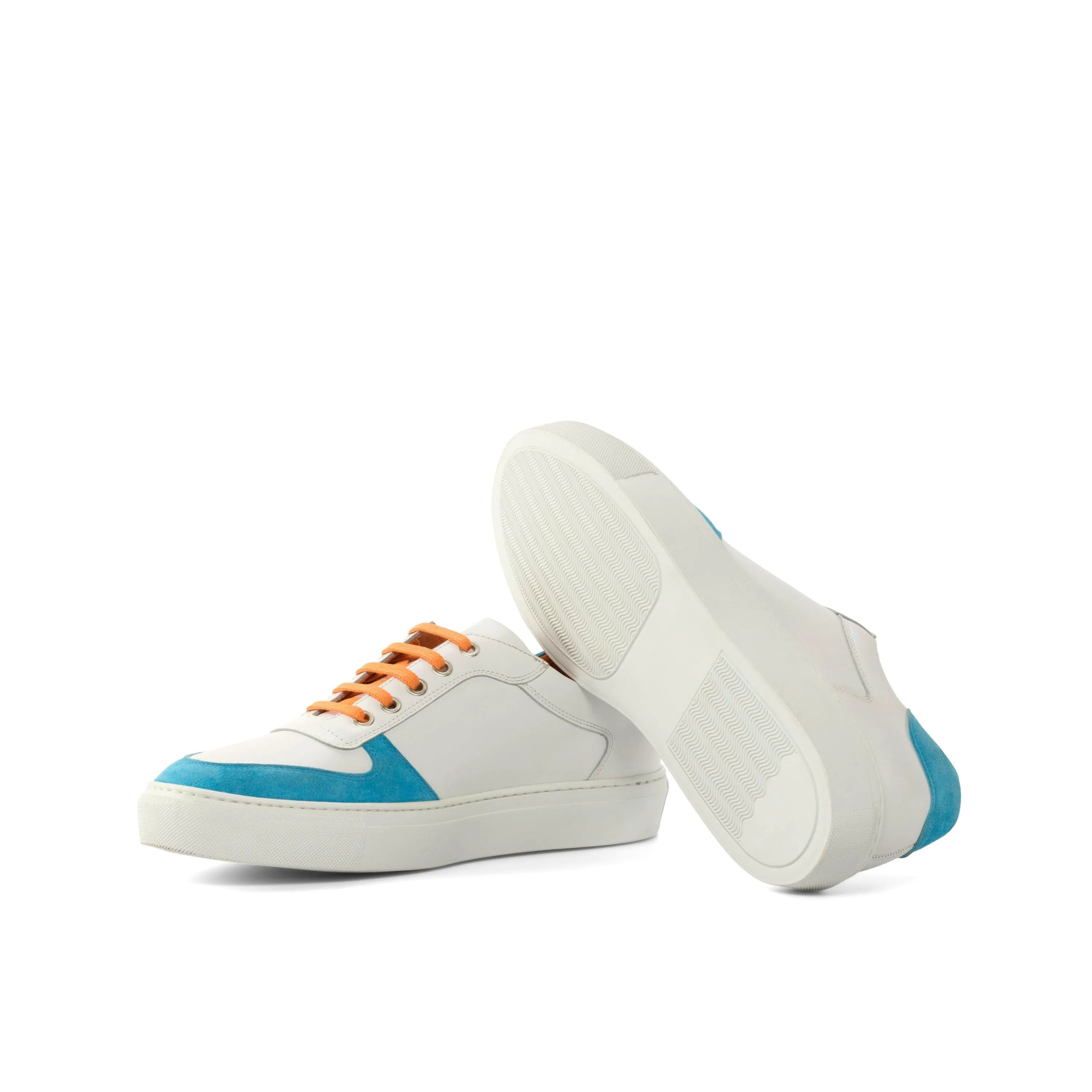 Junos Low white leather sneakers with blue accents, orange laces