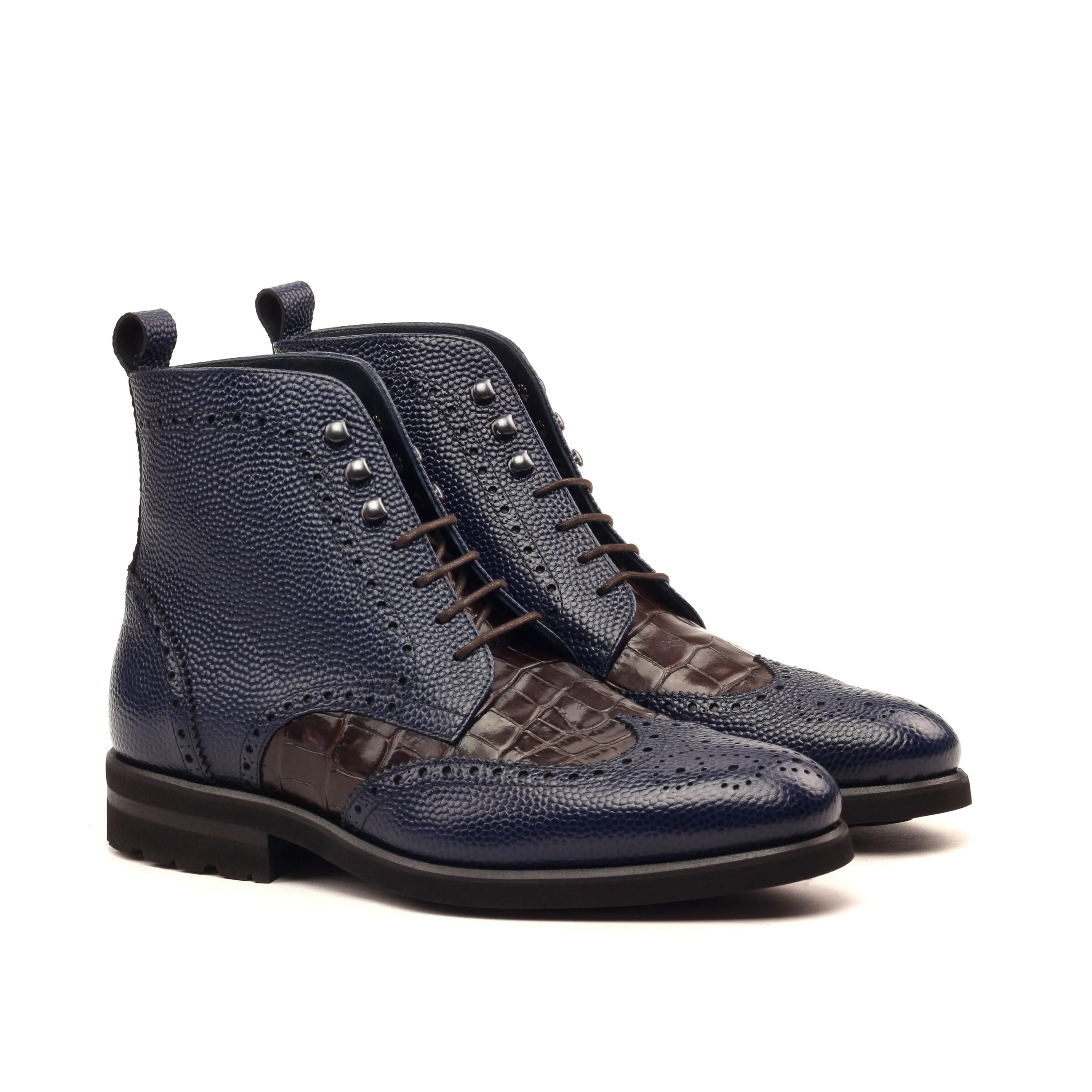 Len military brogue boots in blue and brown leather wingtip design
