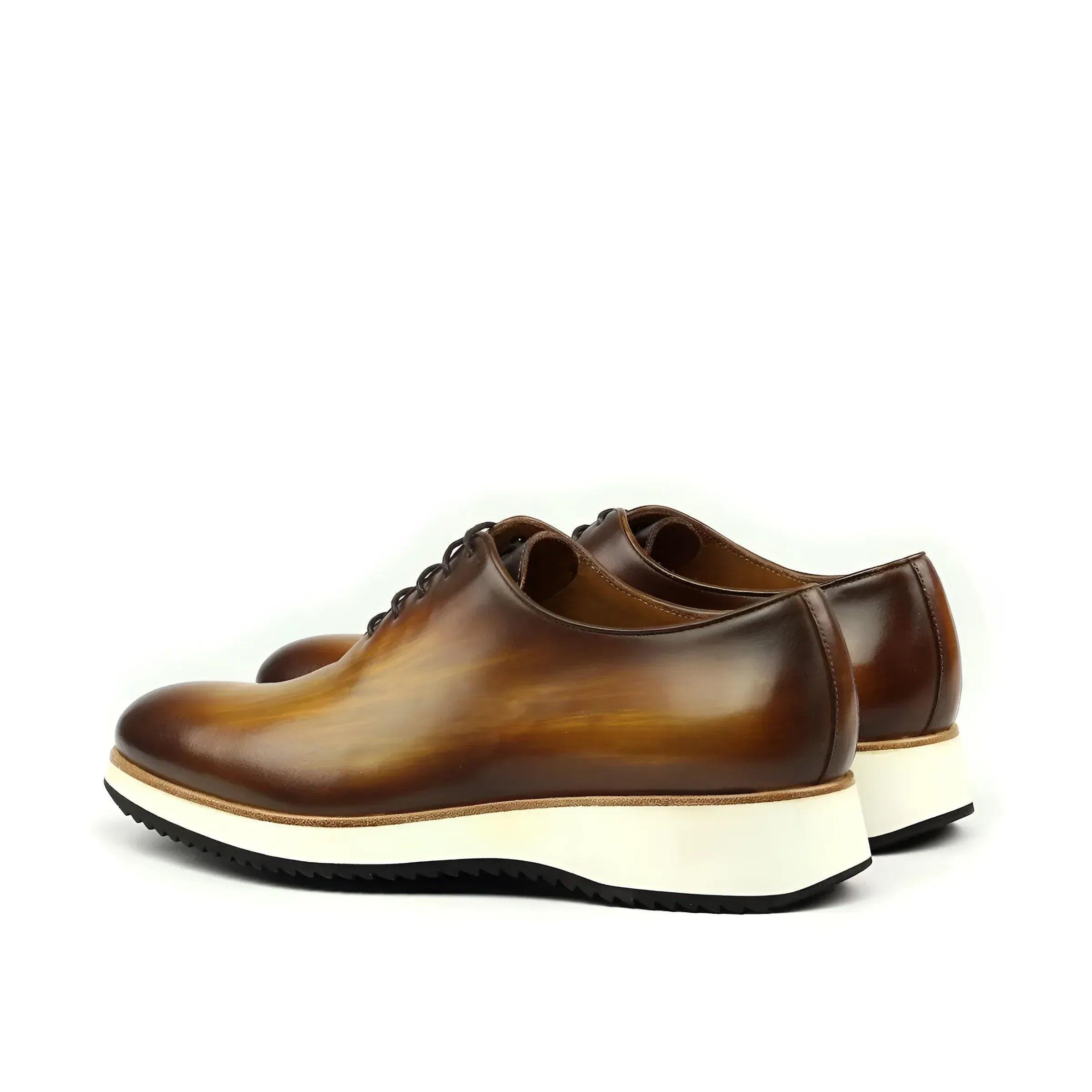 Lloyd wholecut patina shoes with brown leather uppers and white soles