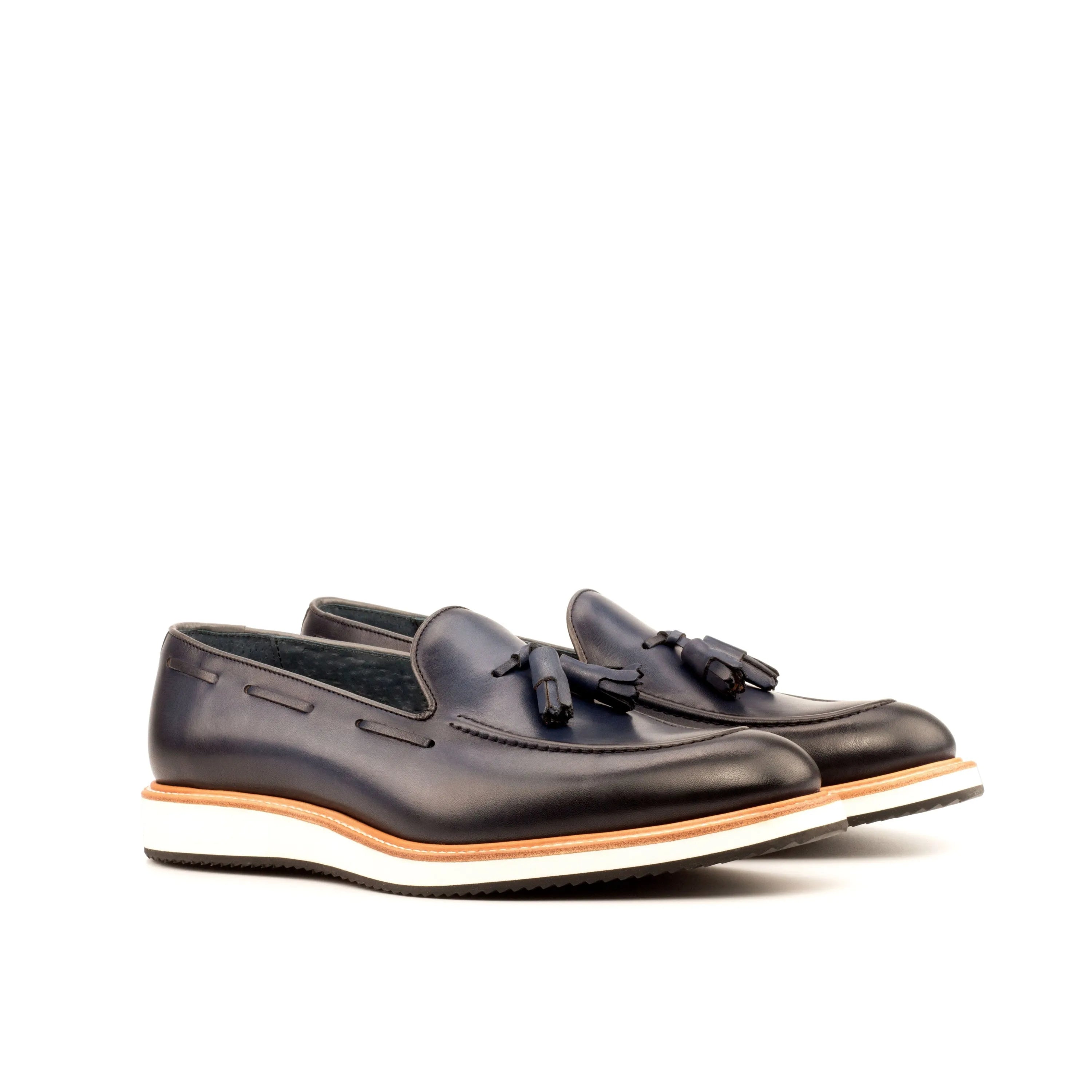 Pair of navy Lodino loafers, luxury bespoke shoes for men