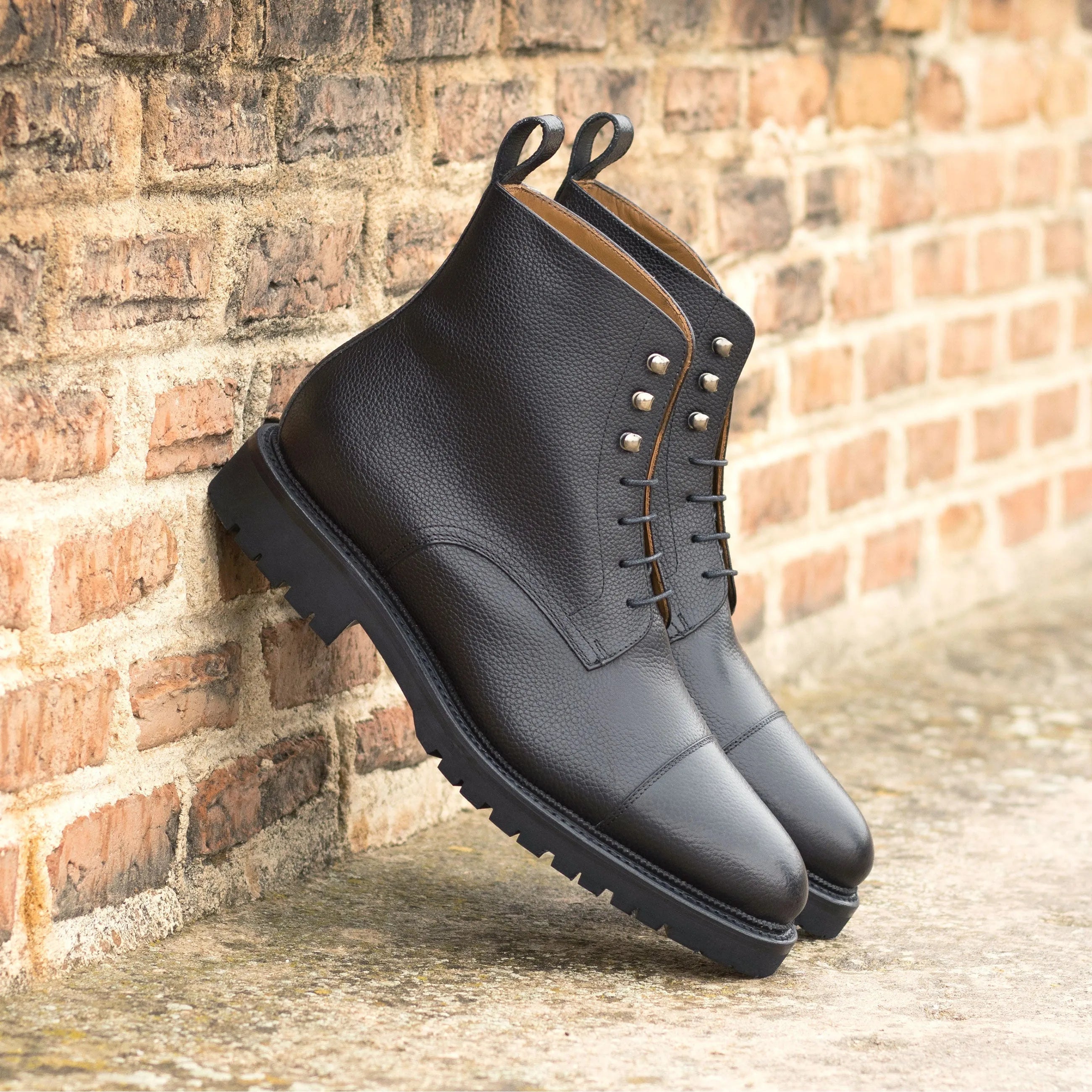 Primus Jumper Boots black leather lace-up design