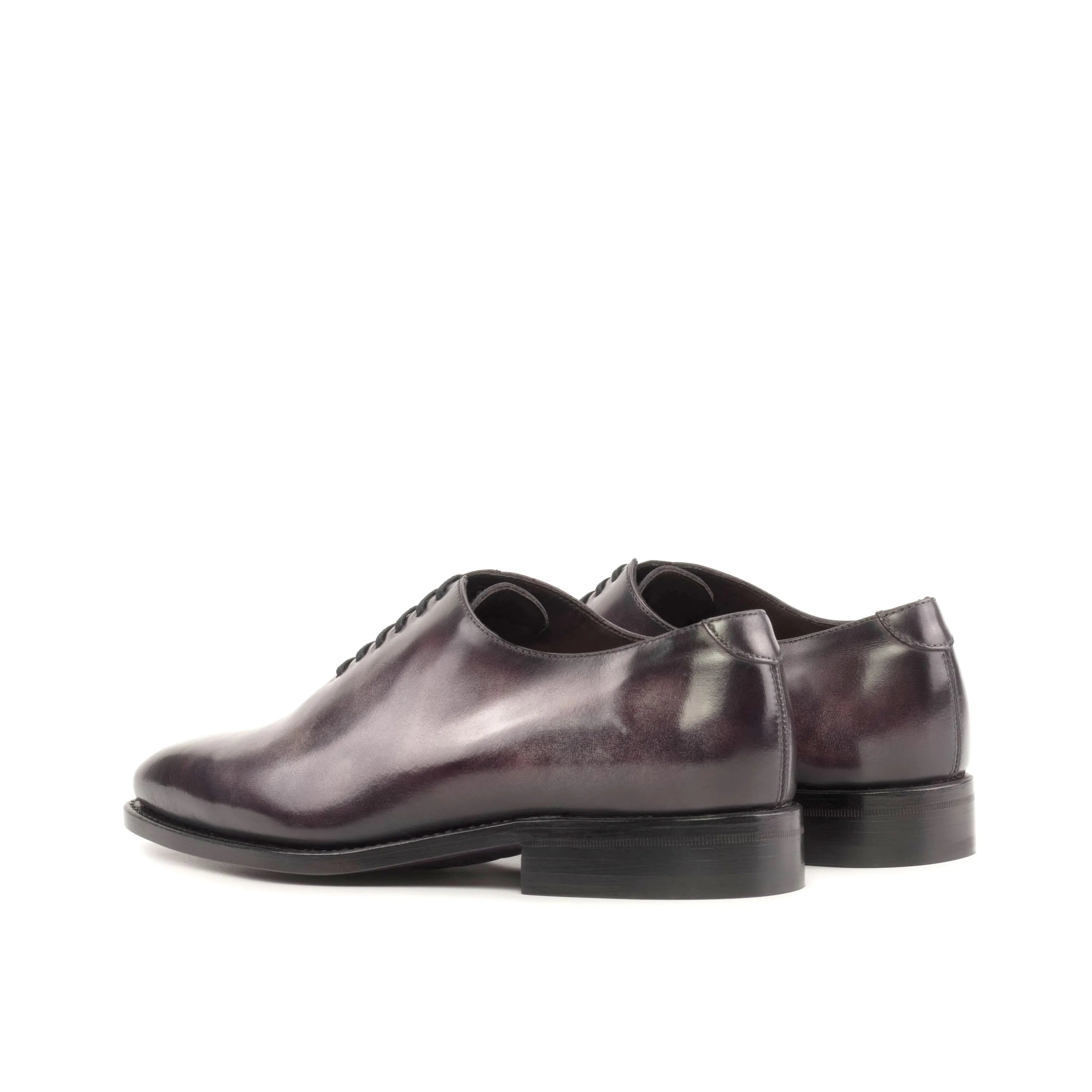 Tinzi Patina Wholecut shoes: pair of polished leather dress shoes