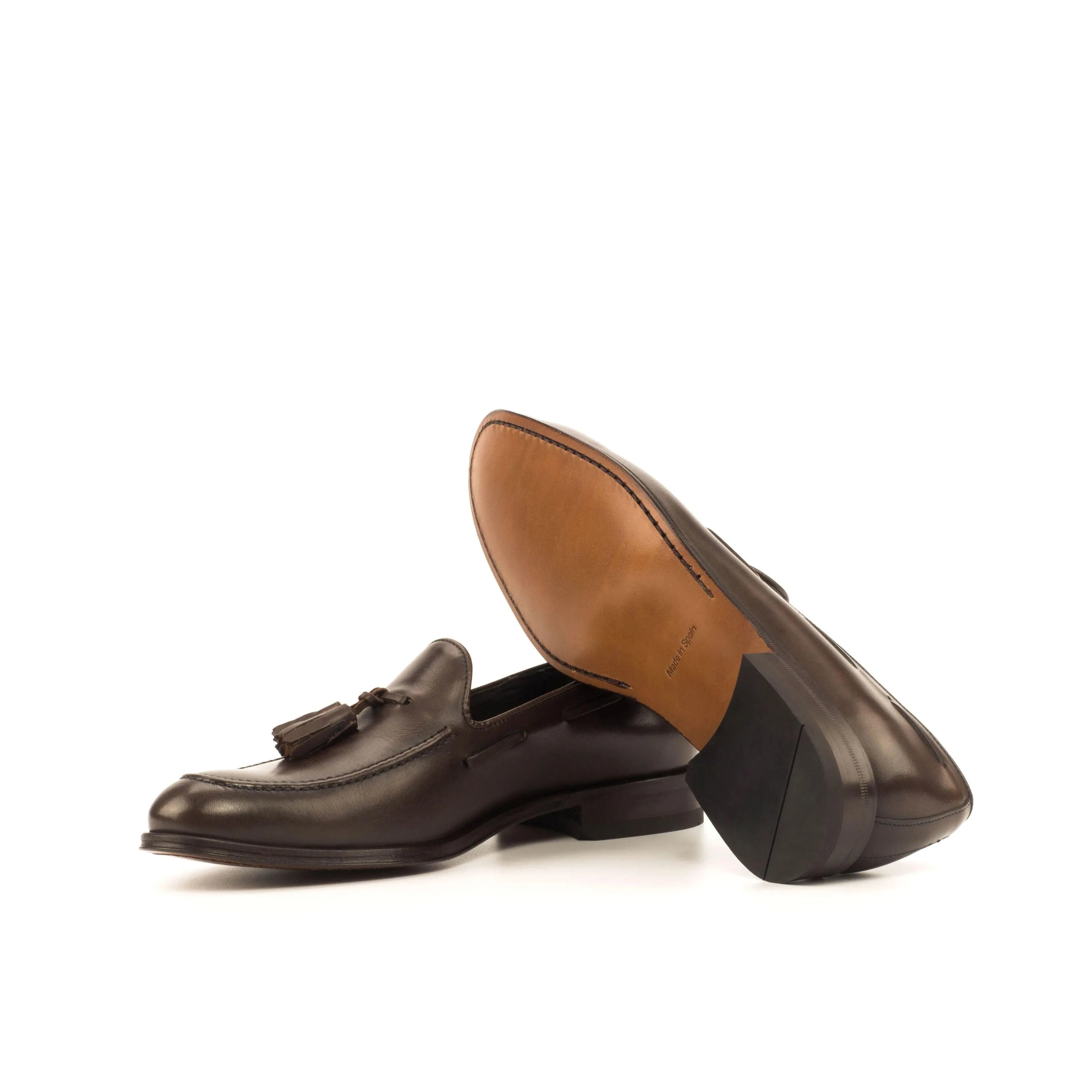 Dark brown Wachiwi Loafers II with rounded toe and leather tassels